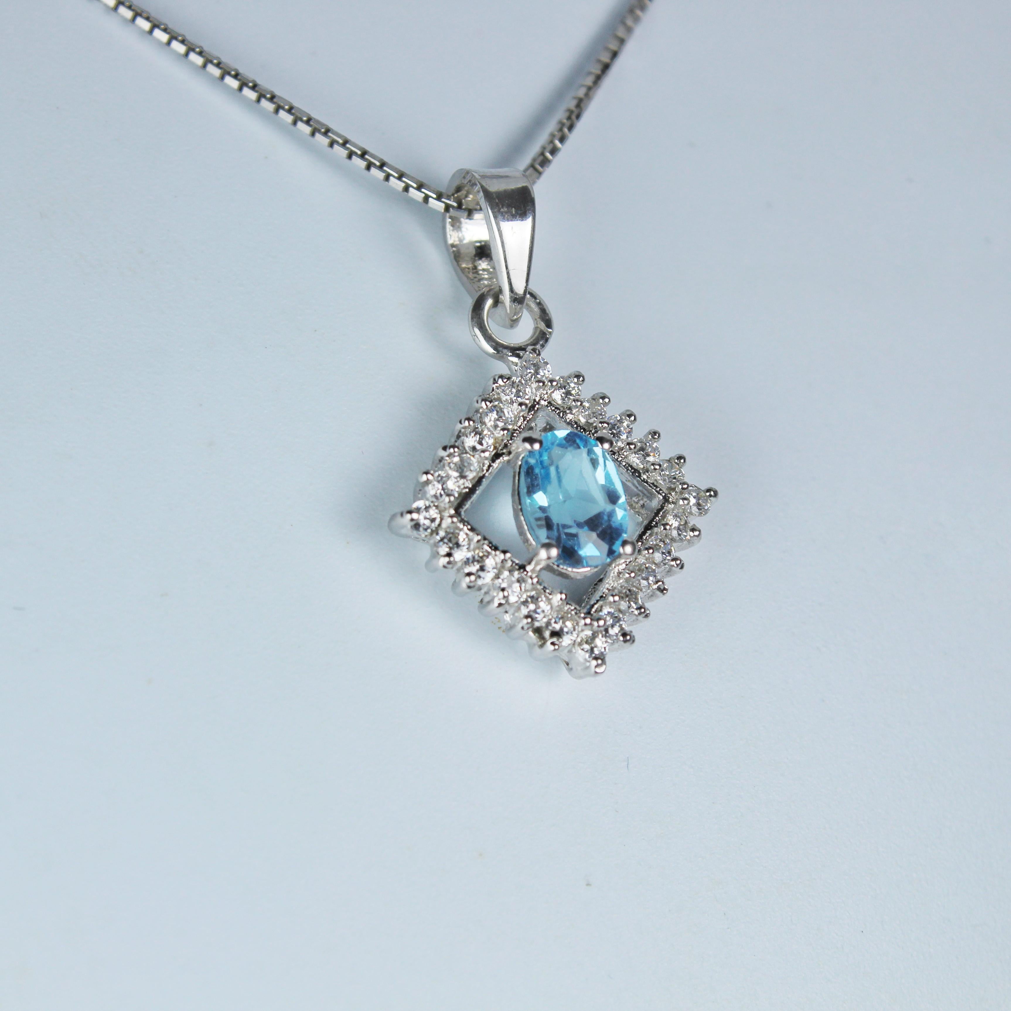 Product Details:

Metal of pendant - Sterling Silver
Diamonds - synthetic
Pendant size (without bail) - 15 x 15 mm
Pendant gross Weight - 2.47 Grams
Gemstone - Aquamarine
Stone weight - 0.50 Carat
Stone shape - Oval
Stone size - 7 x 5 mm

Timeless