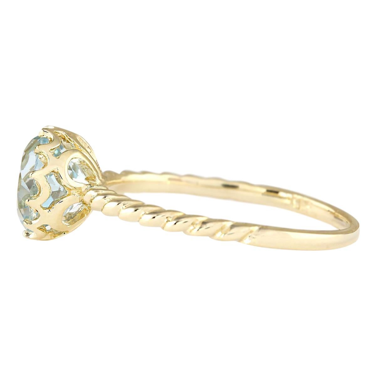 Indulge in the serene beauty of our 1.50 Carat Natural Aquamarine Ring, meticulously crafted in radiant 14K Yellow Gold. Stamped with the distinguished 14K stamp, ensuring its authenticity. With a total weight of 1.8 grams, this ring is both