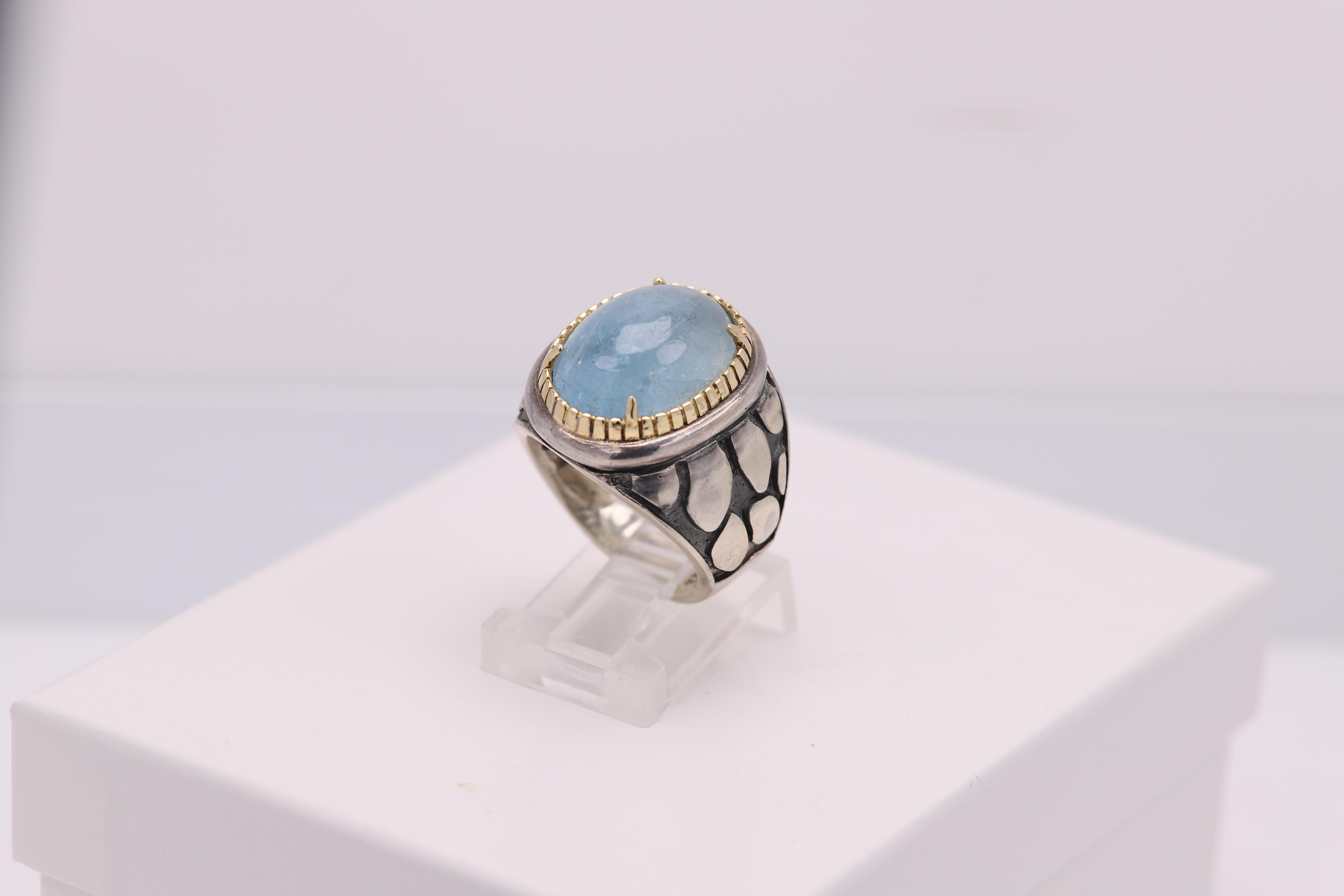 Vintage Brilliant Aquamarine stone
Natural Stone and Cabochon cut.
Approx size 16 x 12 mm
Mostly Sterling Silver 925 and the Bezel is solid 18k yellow Gold
Well craftsmanship - made in Italy
Finger size 6 (can be re-sized)
Overall weight is 13.40