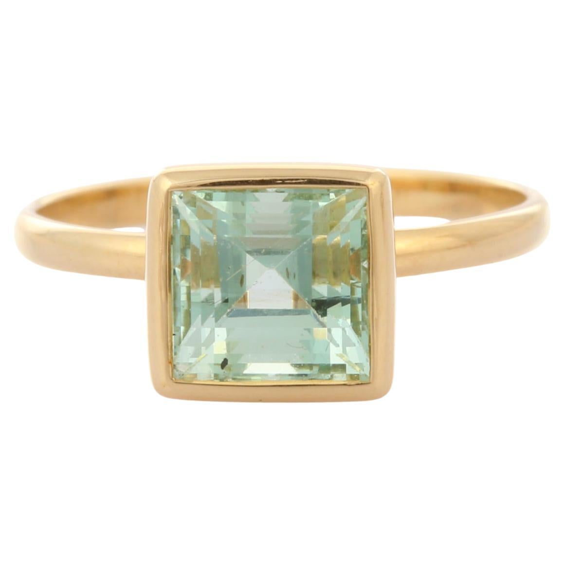 For Sale:  Natural Aquamarine Square Cut Gemstone Ring in 18K Yellow Gold