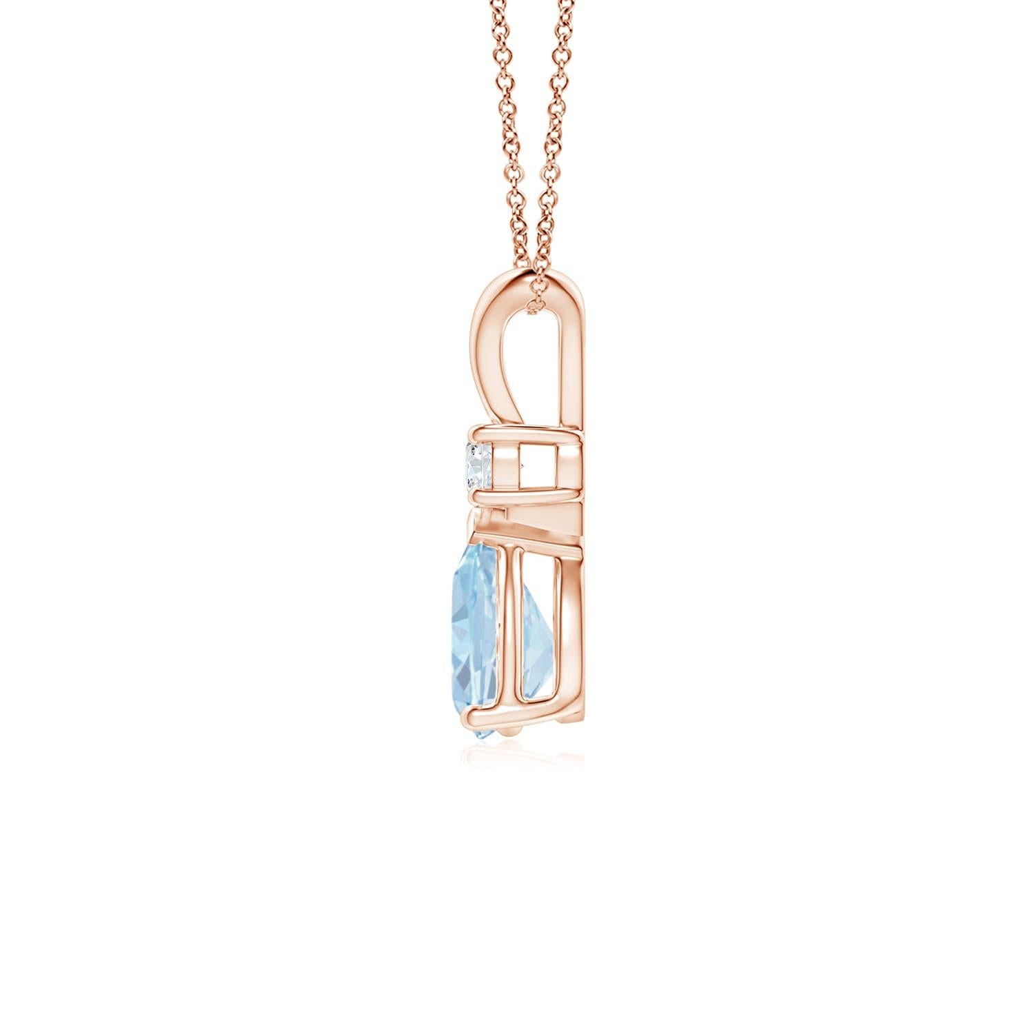 This classic solitaire pendant features a pear-shaped aquamarine secured in a prong setting. A radiant diamond sits atop the pastel blue gemstone adding to the design's sparkle. Crafted in 18k rose gold, this polished v-bale pendant is sure to draw