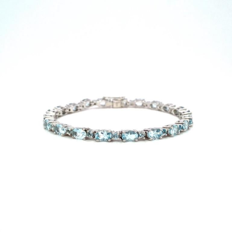 Beautifully handcrafted silver Natural Aquamarine Tennis Bracelet, designed with love, including handpicked luxury gemstones for each designer piece. Grab the spotlight with this exquisitely crafted piece. Inlaid with natural aquamarine gemstones,