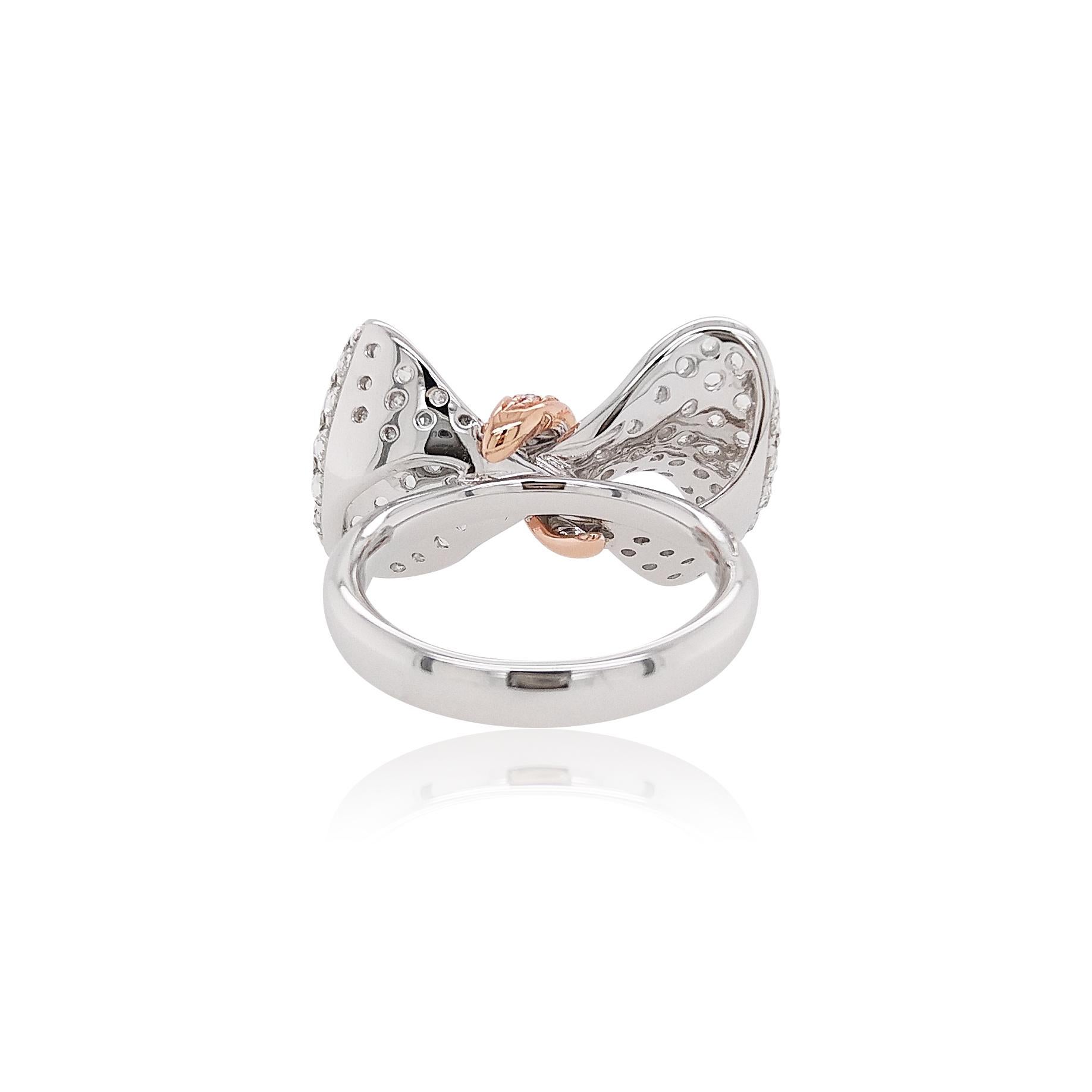 This exquisite ring features lustrous crisp white Rose-cut White Diamonds alongside spectacular natural Pink Diamonds making an adorable bow. Bows and knots are not only beautiful, they impart their own meanings of eternity, remembering and