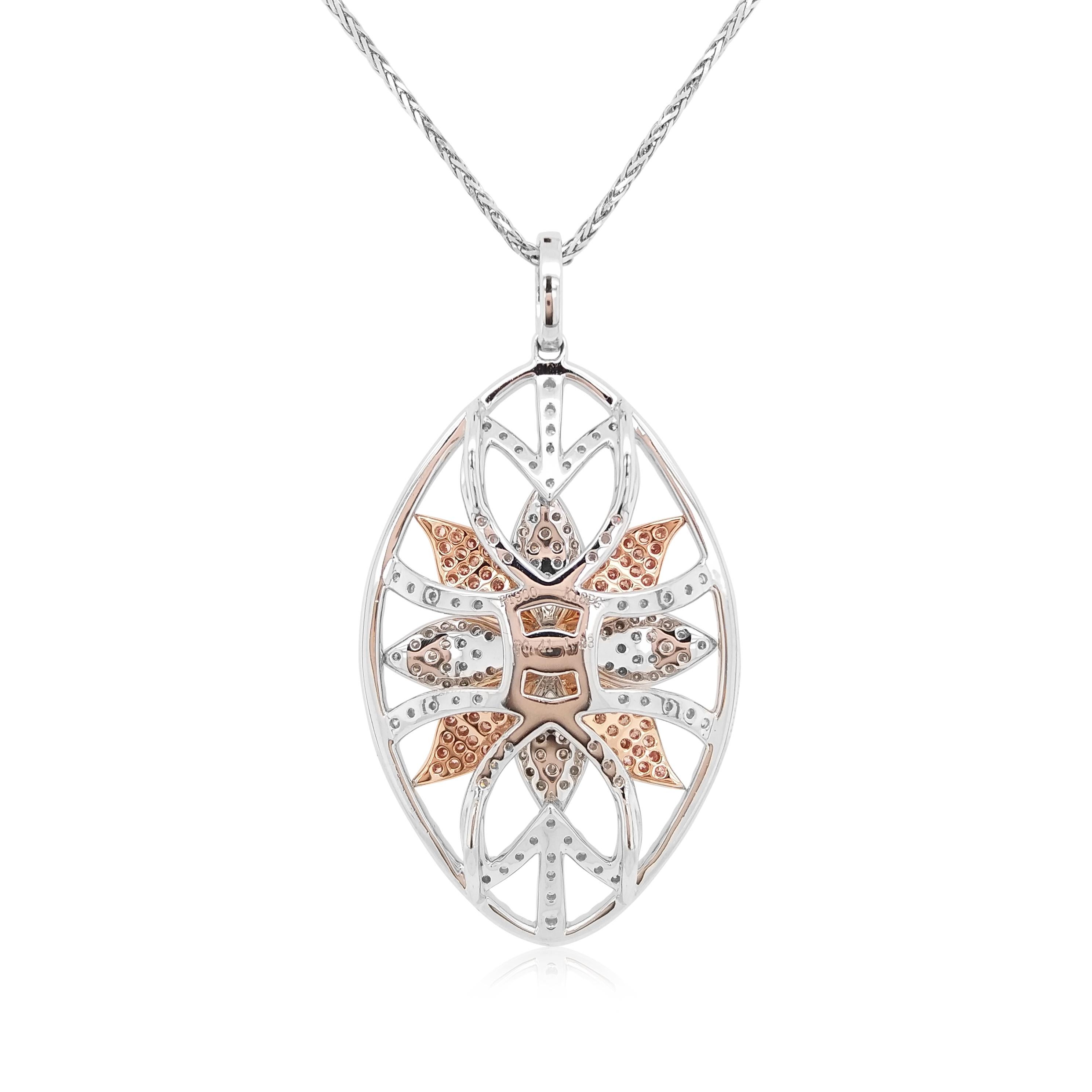 This elegant Platinum pendant features stunning natural Argyle Pink Diamonds and sparkling White Diamonds in a floral-style motif. Easy to wear with any type of outfit, this daily-use pendant will add a touch of glamour to everything it is combined
