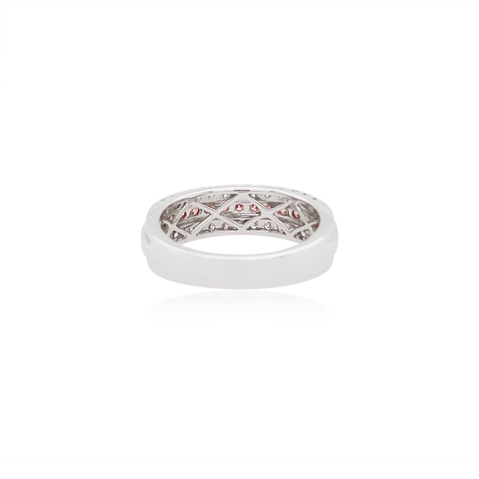 This delicate Platinum ring band features a row of lustrous natural Argyle Pink Diamonds at the forefront of its design. The spectacular hues of the Pink Diamonds are perfectly accentuated by the Platinum and K18 Pink Gold setting and elegant white