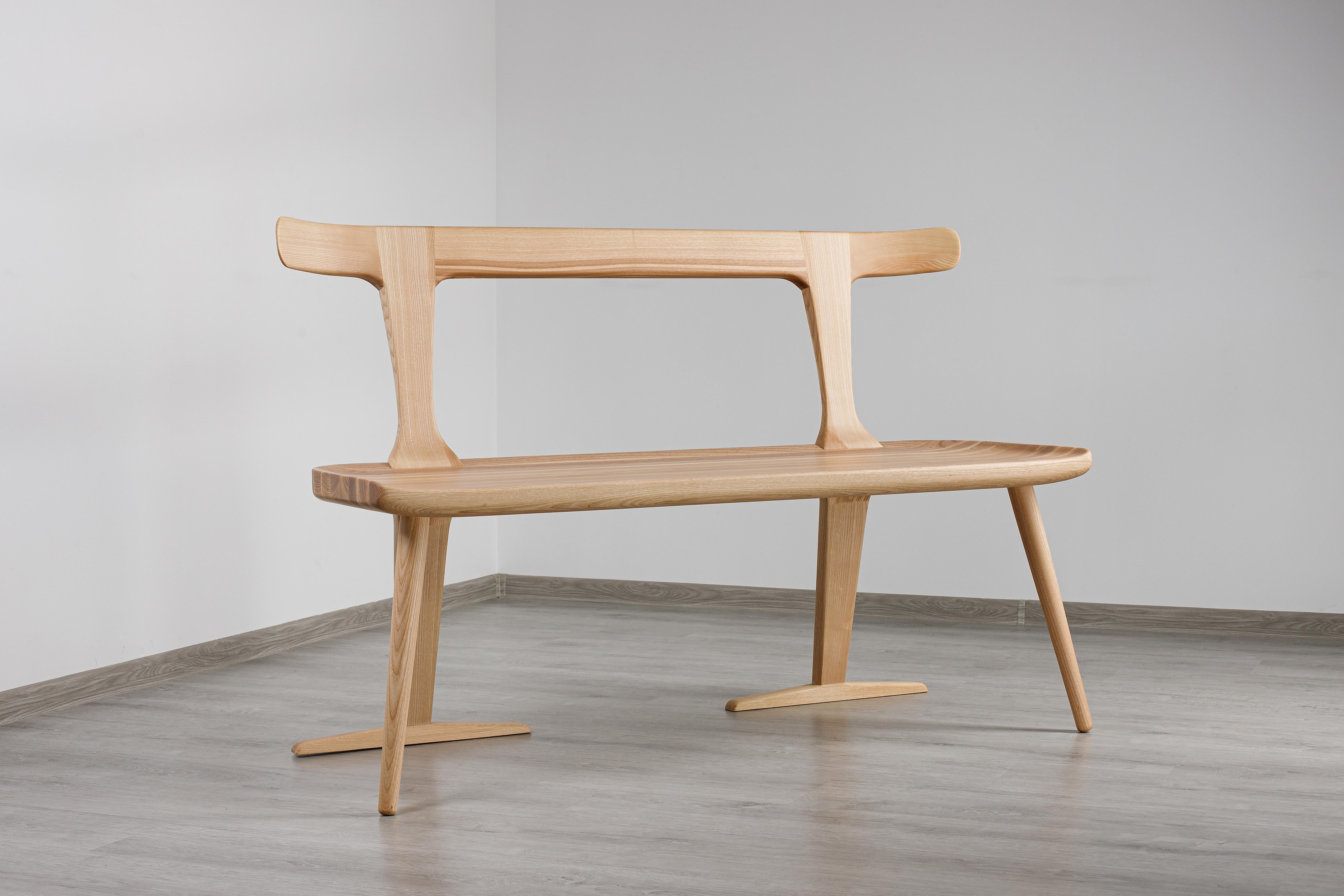 The Eola bench provides a multi-use bench that can be easily placed in the kitchen, dining room, den, lounge or other space. With a double backing and forward angled legs, this Mid-Century Modern piece offers a uniqueness that otherwise cannot be