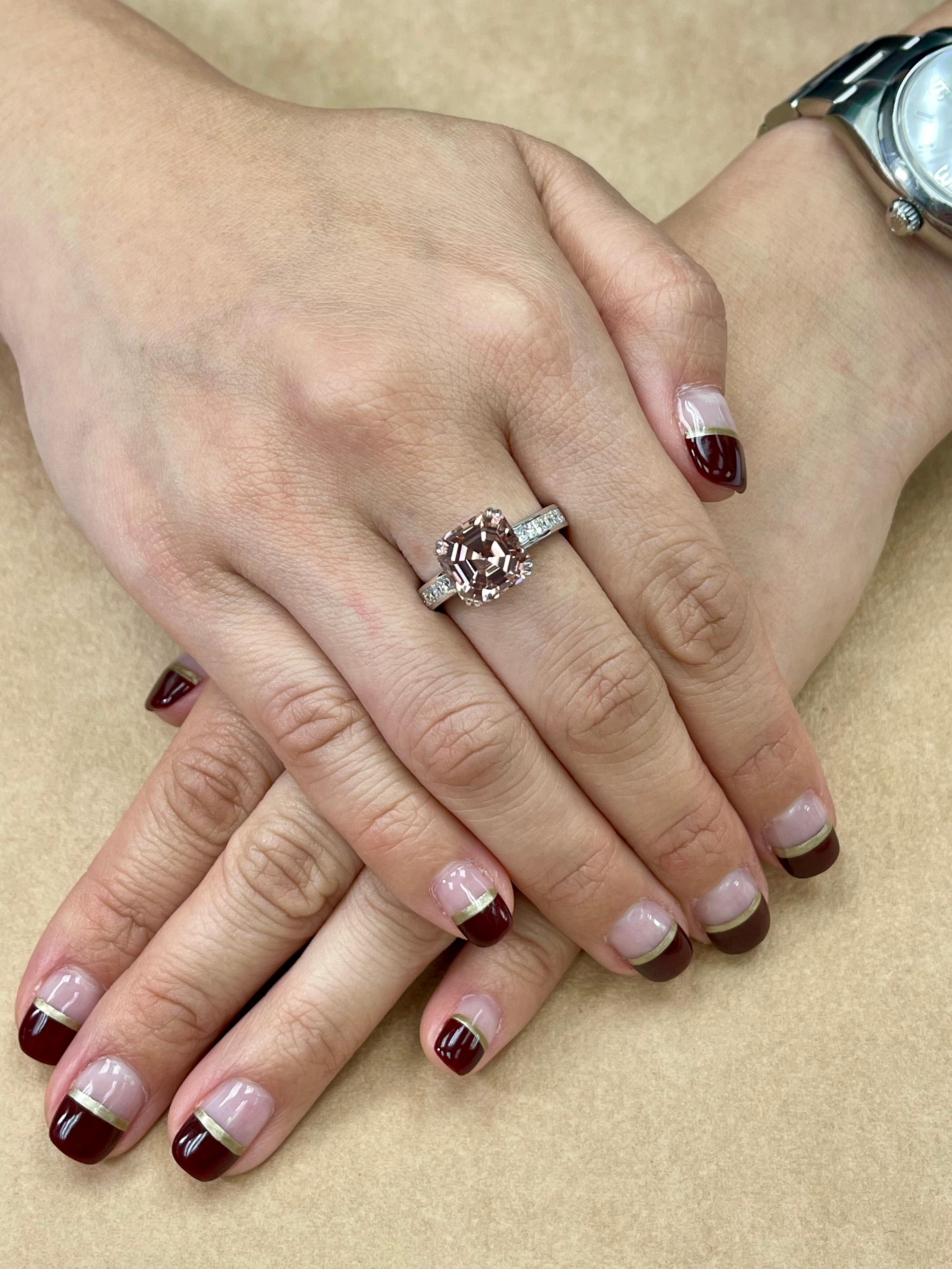 Please check out the HD video for the most accurate color representation! Here is a nice natural peach pink tourmaline ring with princess cut white diamonds. This ring will defiantly make a statement. The color really 