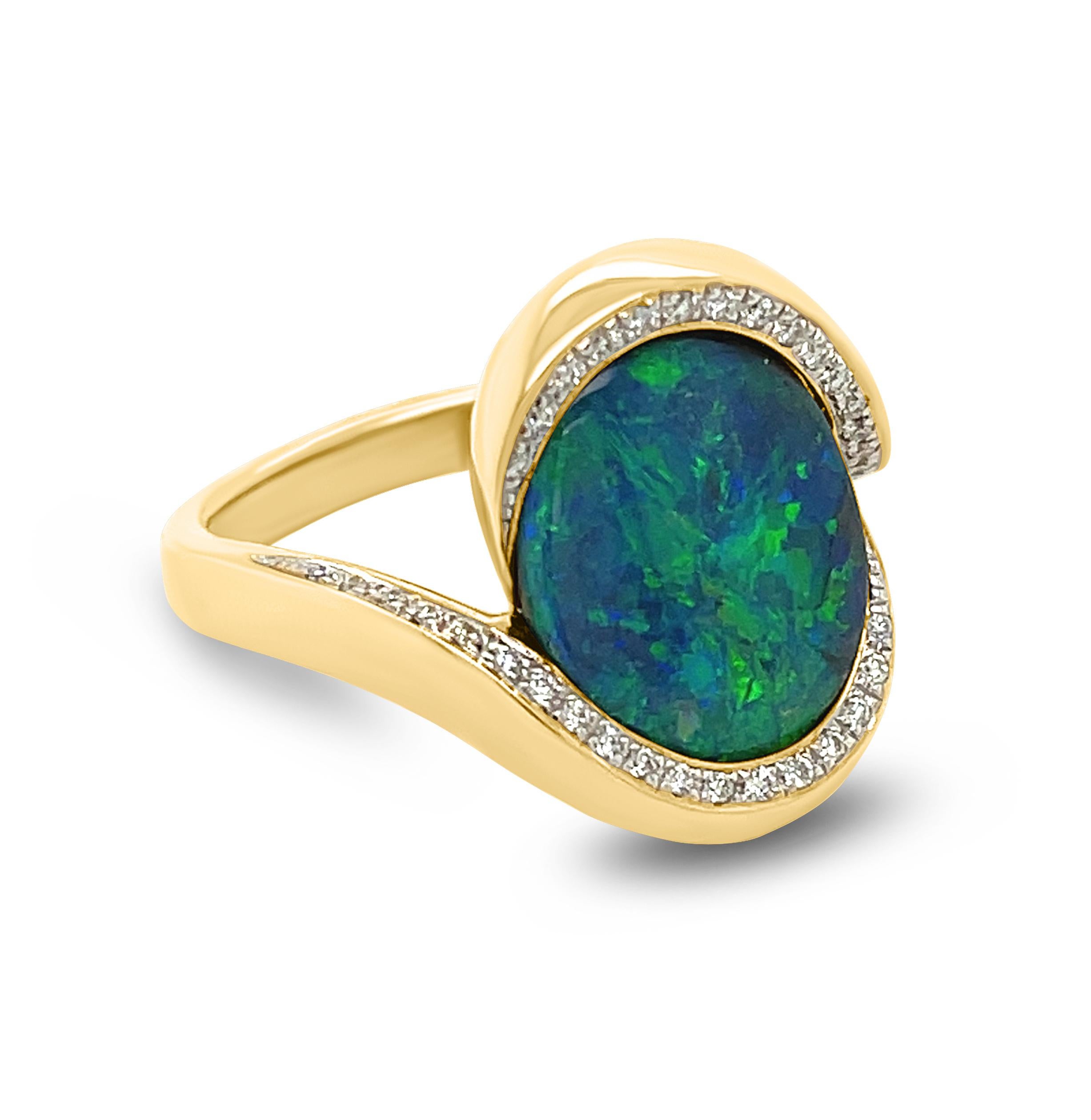 The ‘Gabriella’ opal engagement ring features a gracefully elegant and unique black opal (3.35ct) sourced from Lightning Ridge opal mines in NSW, Australia. The rare play-of-colour in this black opal is absolutely magnificent. Masterfully crafted in