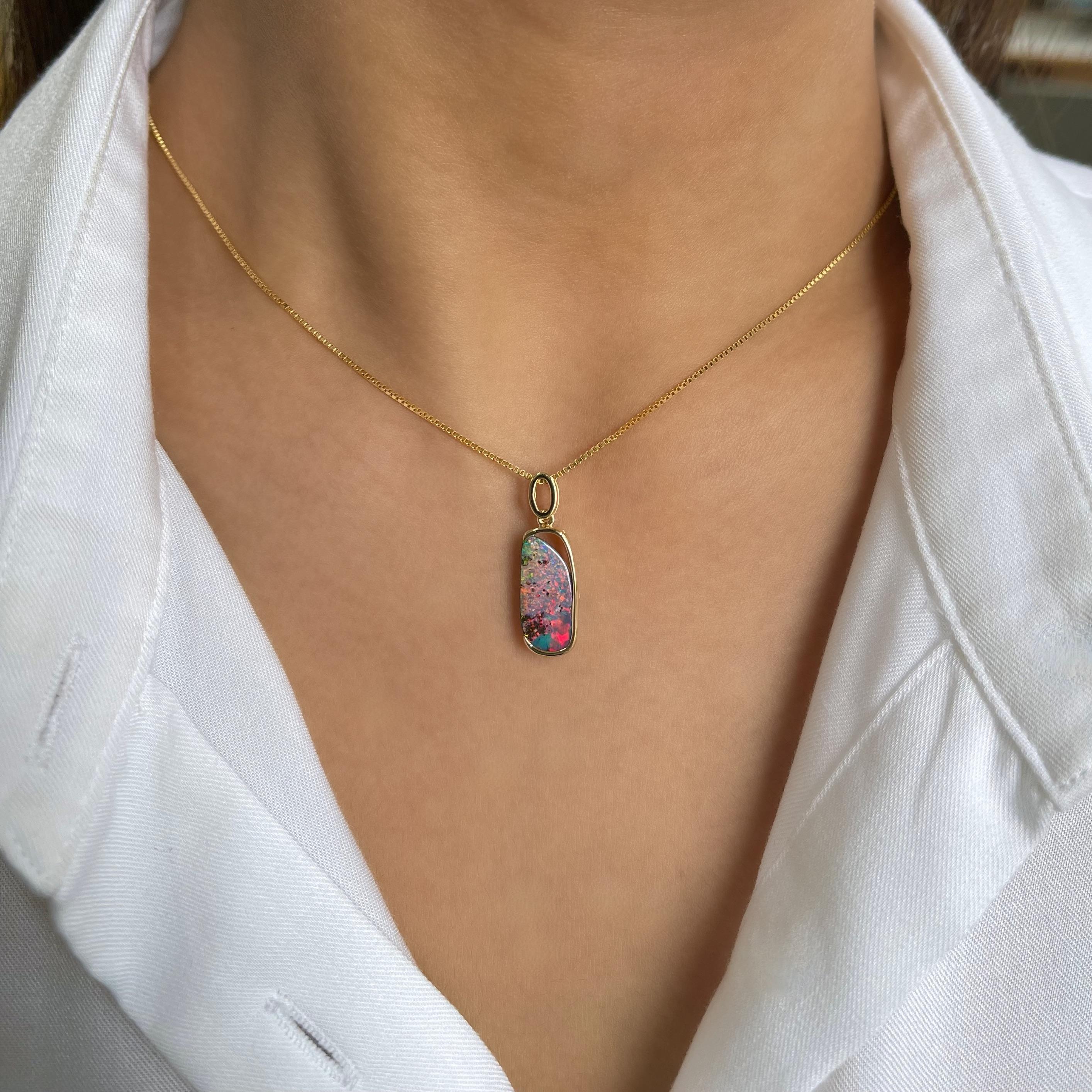 Mysterious and ravishing is the wearer of the 'Sonata' opal pendant set in graceful 18K gold and is ethically sourced from Jundah-Opalville, Opal Minded's own mines. The piece features a precious boulder opal (3.43ct) presenting rainbow hues