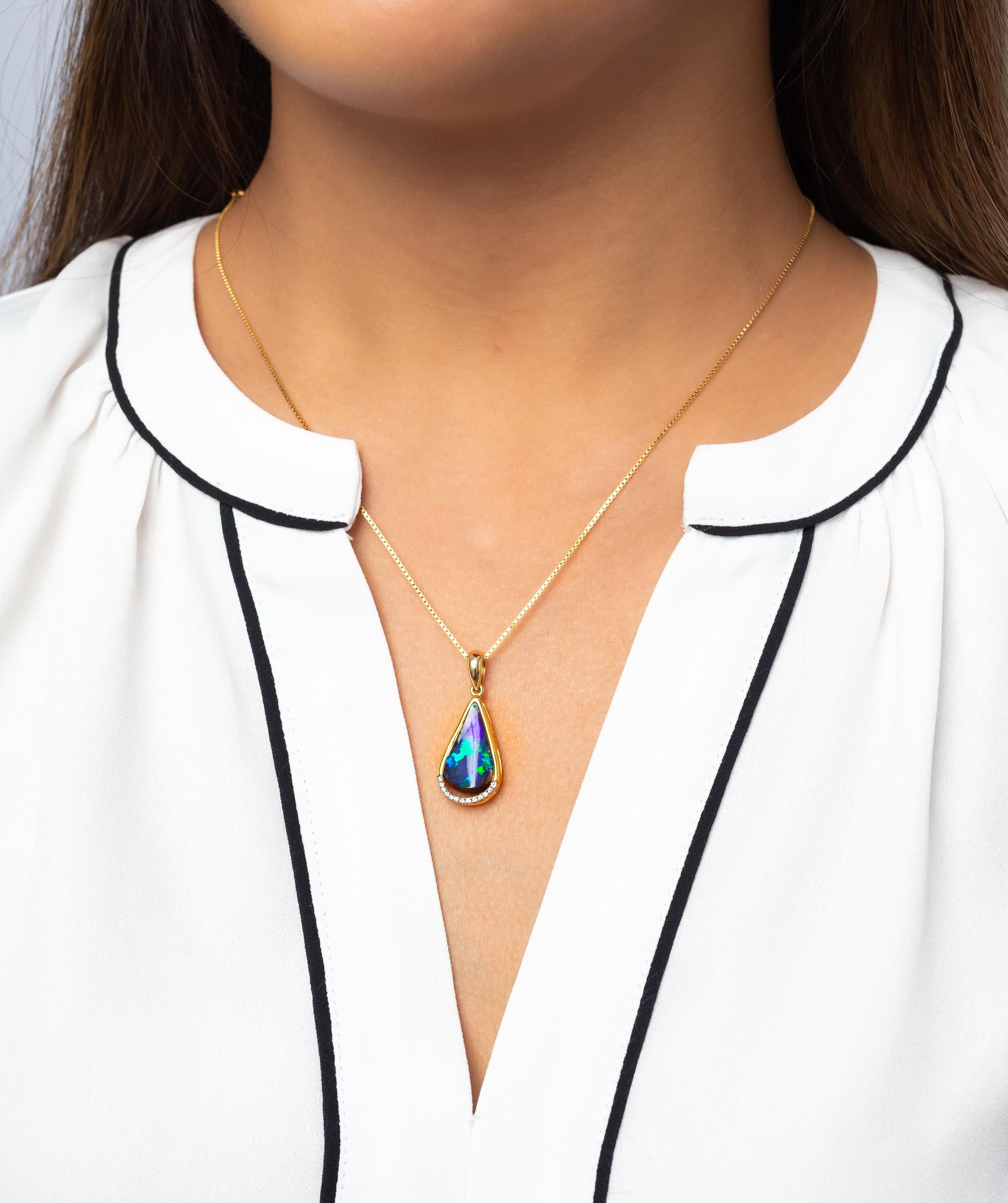 “A Love Song” opal pendant is understated elegance. The 5.81ct Winton boulder opal is framed by 18K yellow gold and cradled by glittering diamonds. For the times you can’t find the words to express your love. Designed by Renata Bernard. This pendant