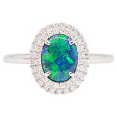 Natural Australian AAA Intensity Black Opal and Diamond Halo Ring 14 Karat Gold