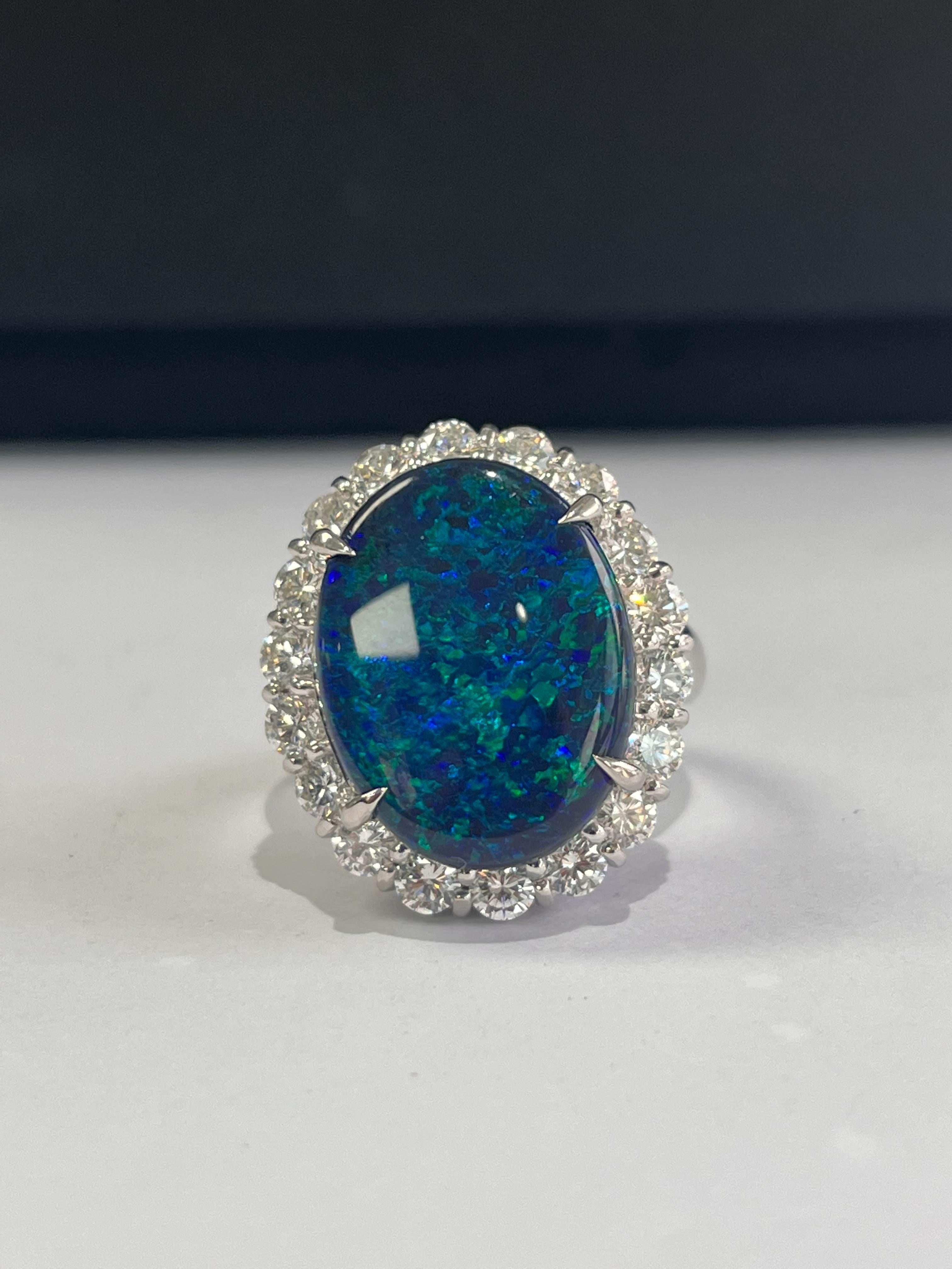 A very important and gorgeous Opal Engagement / Cocktail Ring set in Platinum 900. The weight of the Opal is 8.65 carats. The Opal is completely natural, without any treatment & is of Australian origin. The weight of the Diamonds is 1.75 carats. Net