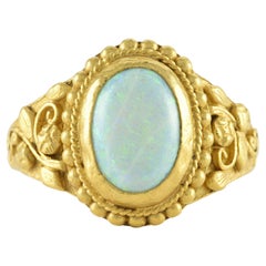 Bague en or jaune 22 carats et opale naturelle d'Australie
