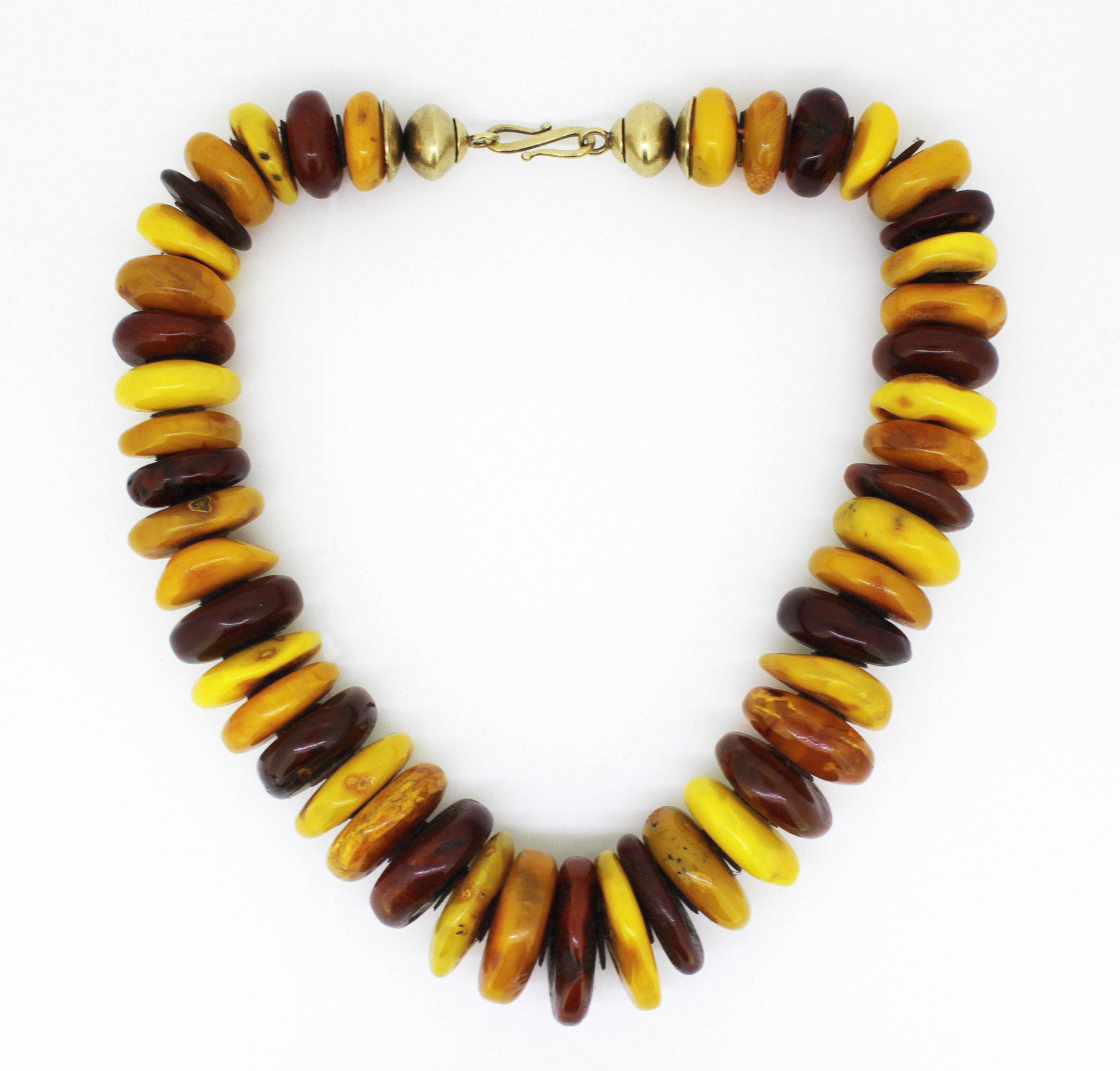 Natural Baltic amber necklace in the form of tablets.
Circa 1950's

Dimensions -
Length : 48.5 cm
Width : 3 cm
Weight : 166 grams

Amber - 
Treatment : Natural

Condition: Pre-owned, general used, no damage, excellent overall condition, please see