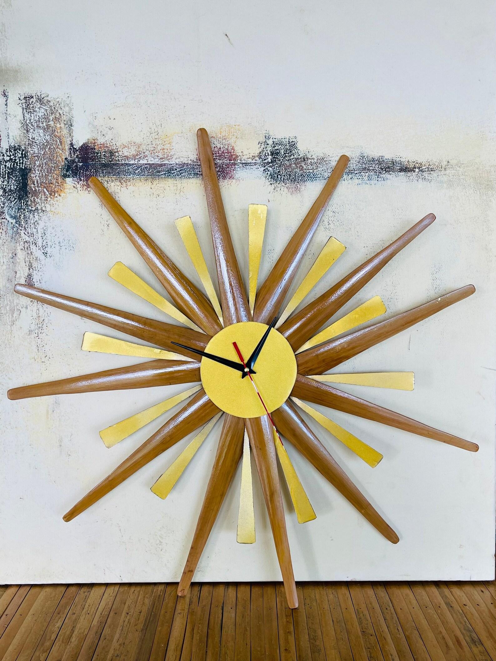 This is a high-quality natural rattan and bamboo mid-century style Starburst Clock Hand crafted by the local artisans in the Philippines

The clock measures 40cm in diameter

Organic Bamboo with clear lacquer (All bamboo pieces were treated with