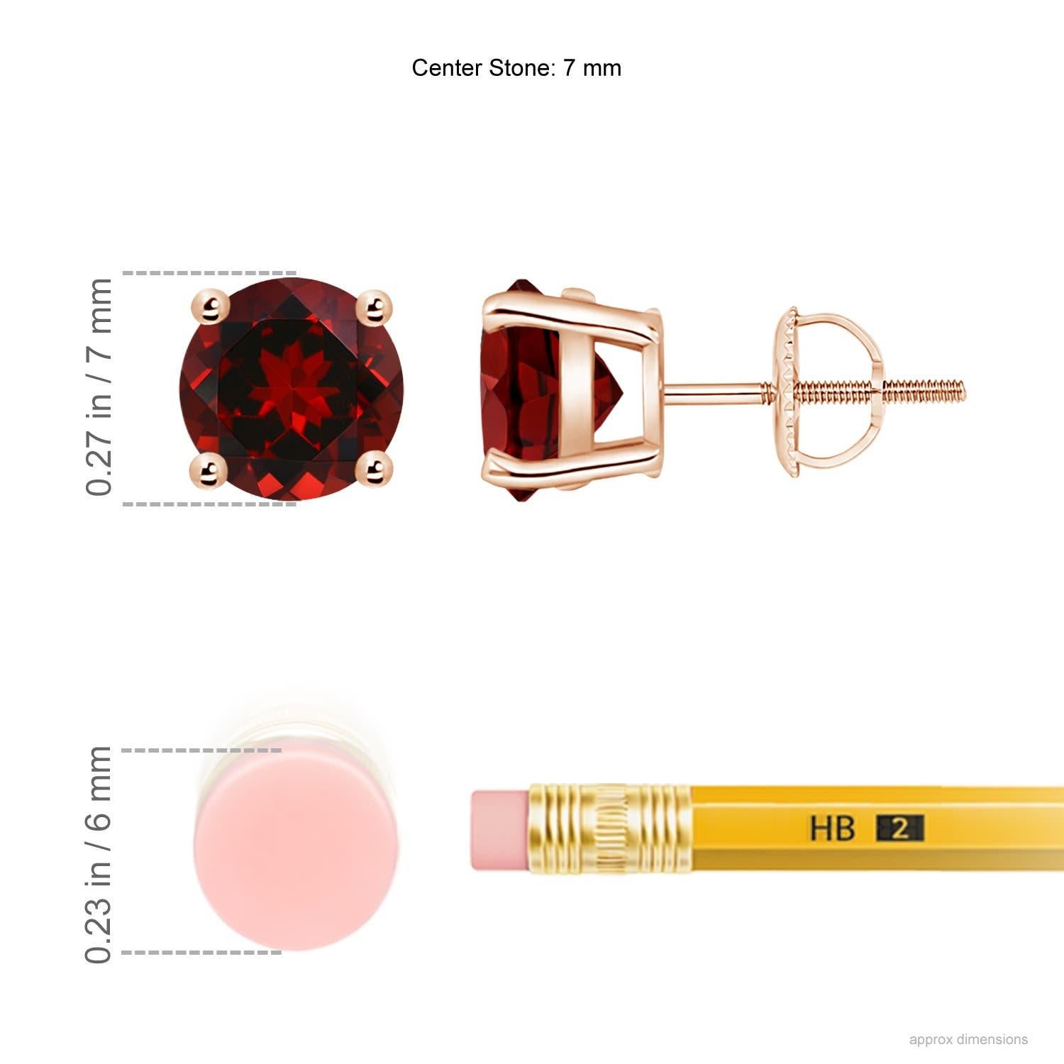 The beauty of these classic garnet stud earrings lies in their simple design and deep red hue. Secured in a 14K rose gold basket prong setting, the round garnets look elegant.