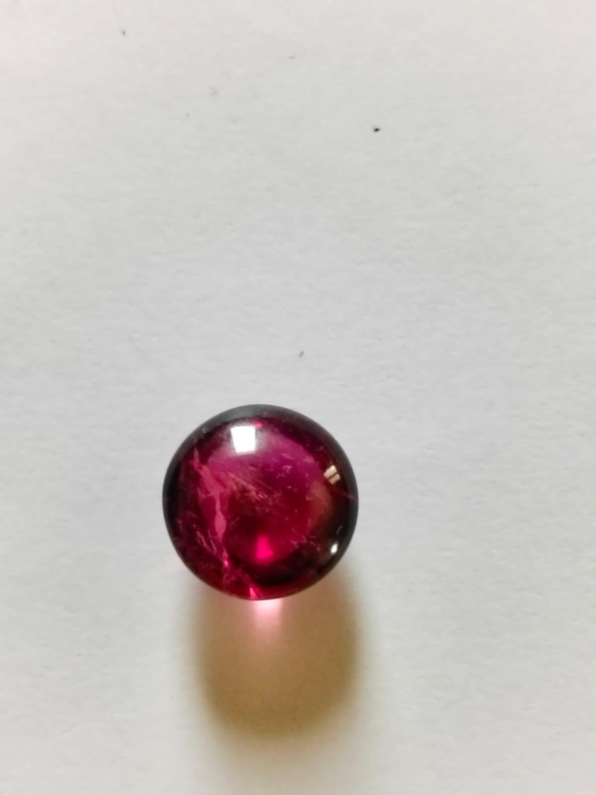 Natural Rubellite Cabochon Round Cut Gemstone.
15.41 Carat with a elegant Red color and excellent clarity. Also has an excellent fancy Round cut with ideal polish to show great shine and color . It will look authentic in jewelry. The dimensions of
