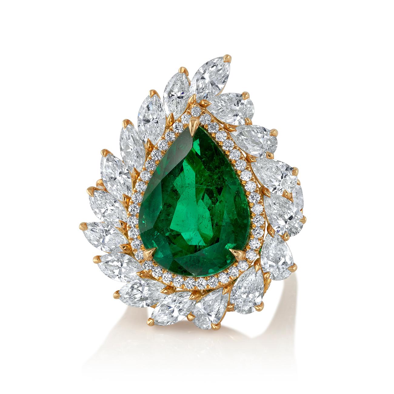 Ring Size: 6
18K yellow gold
11.24CT Natural Beryl Zambian Pear Shape Emerald
8.29ctw I-J/VS Pear Shape, Marquis Cut, and Round Brilliant Diamonds
Includes de Boulle box, C. DUNAIGRE Certificate for Emerald
