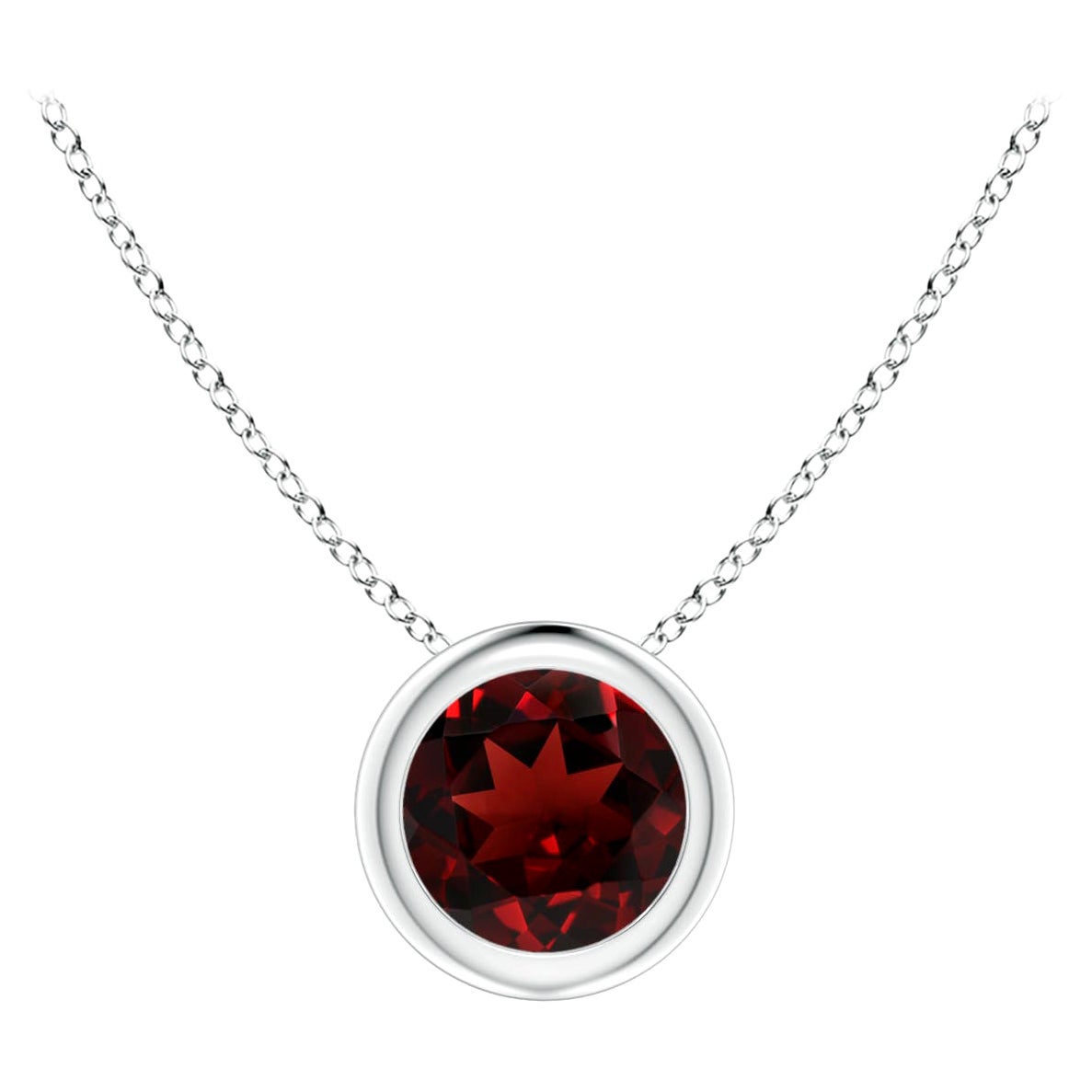 Pendentif solitaire rond en platine serti d'un grenat naturel de 0,60 carat