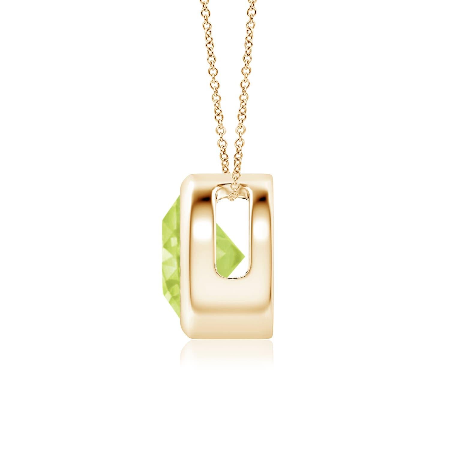 The olive green round peridot appears to be floating on the chain. It is secured in a 14k yellow gold bezel setting. This simple yet alluring peridot pendant is designed to make an elegant statement. Available in different carat weight. 

Peridot is