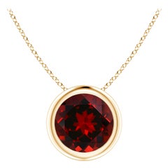 Natural Bezel-Set Round 1.5ct Garnet Solitaire Pendant in 14K Yellow Gold