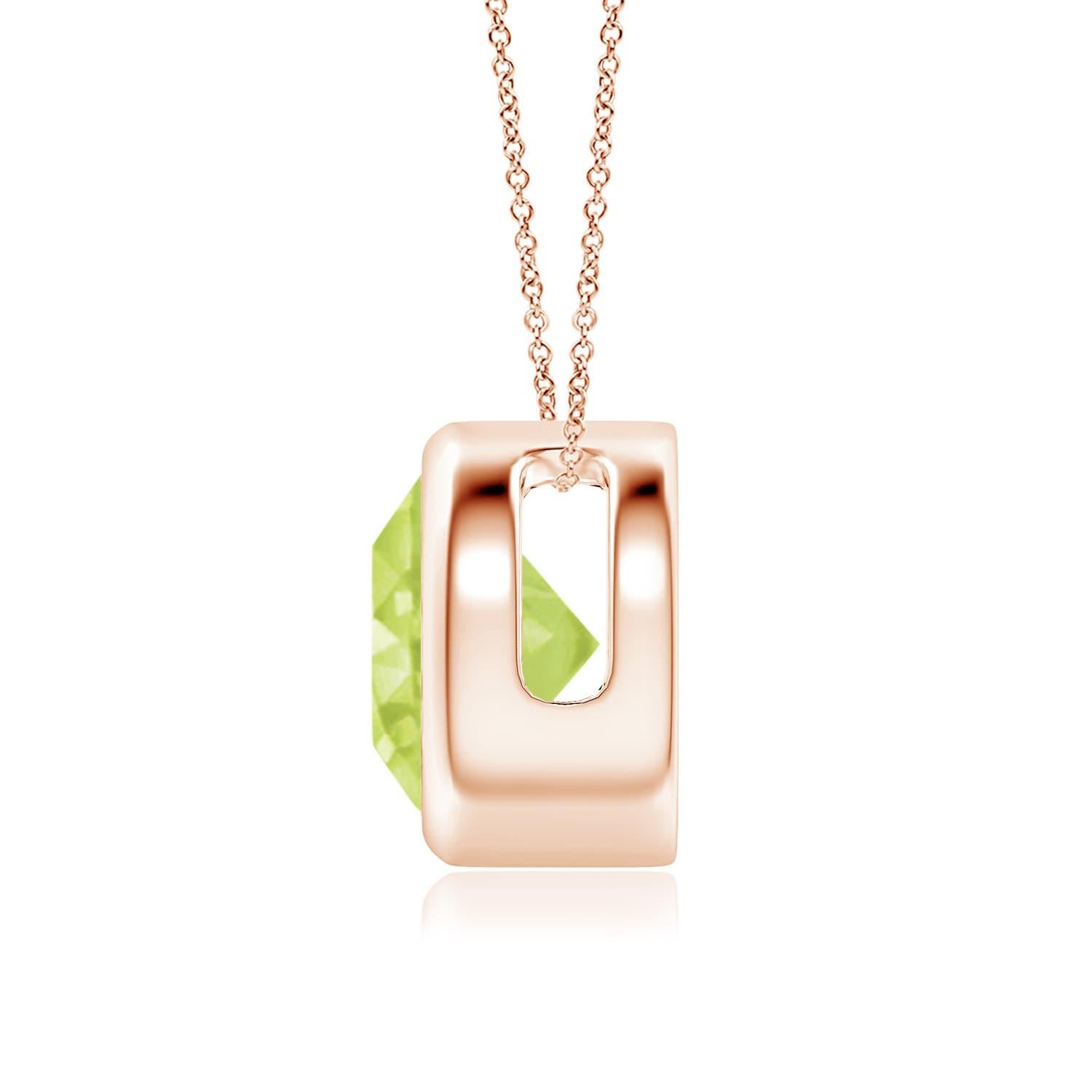 The olive green round peridot appears to be floating on the chain. It is secured in a 14k rose gold bezel setting. This simple yet alluring peridot pendant is designed to make an elegant statement. Available in different carat weight. 

Peridot is