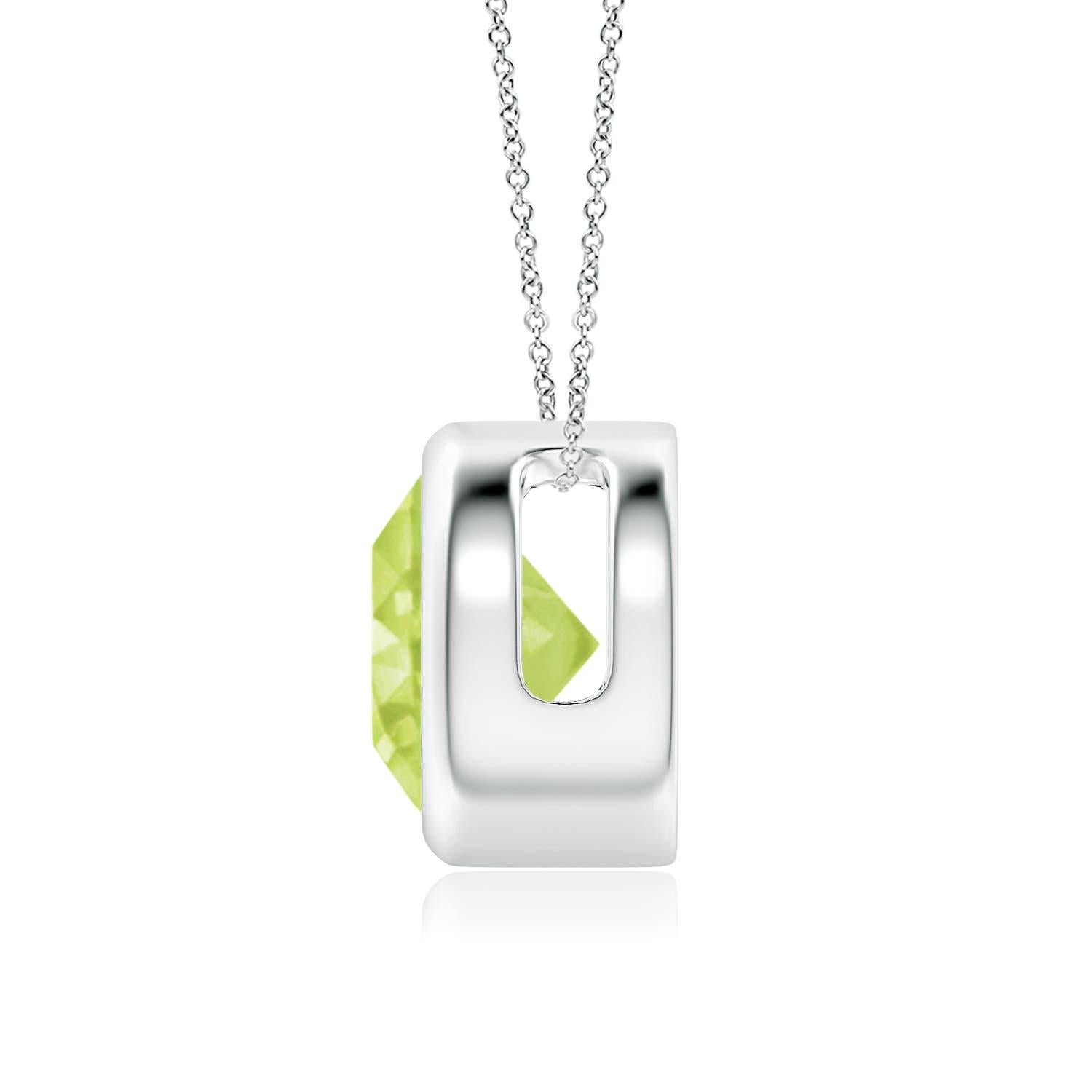 The olive green round peridot appears to be floating on the chain. It is secured in a 14k white gold bezel setting. This simple yet alluring peridot pendant is designed to make an elegant statement. Available in different carat weight. 

Peridot is