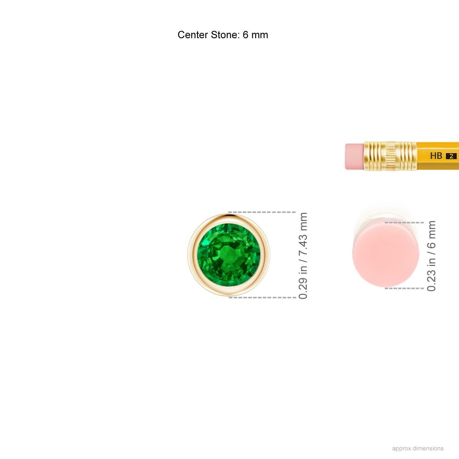 Le magnifique design de ce pendentif solitaire classique en émeraude donne l'impression que la pierre centrale flotte sur la chaîne. L'émeraude verte luxuriante est fixée dans un chaton. Réalisé en or jaune 14k, ce pendentif en émeraude ronde est à