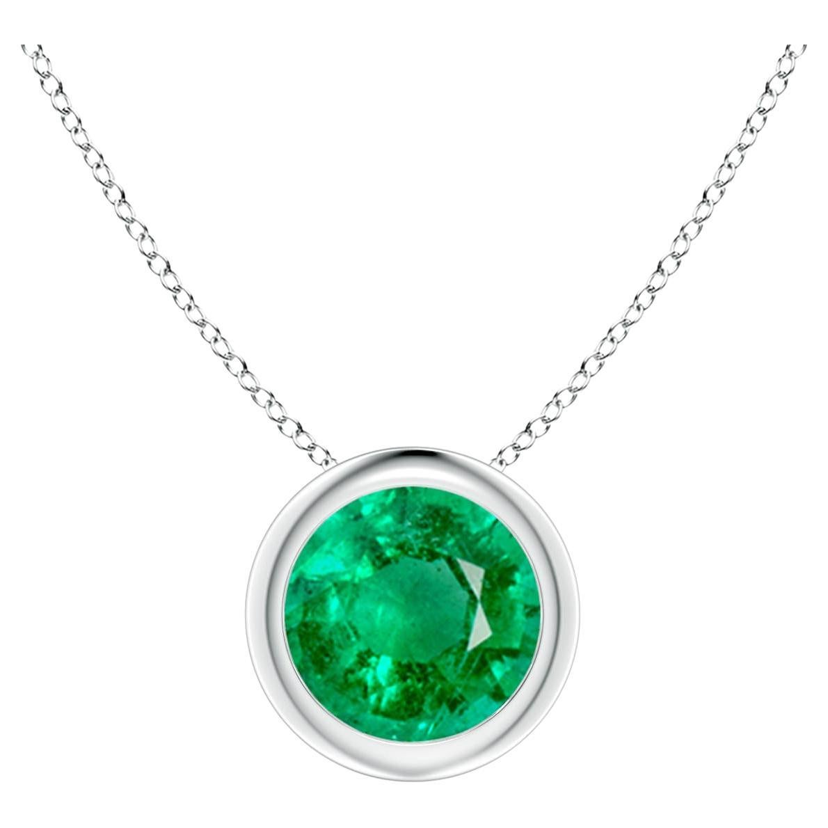 Natural Bezel-Set Round Emerald Solitaire Pendant in Platinum (6mm) For Sale