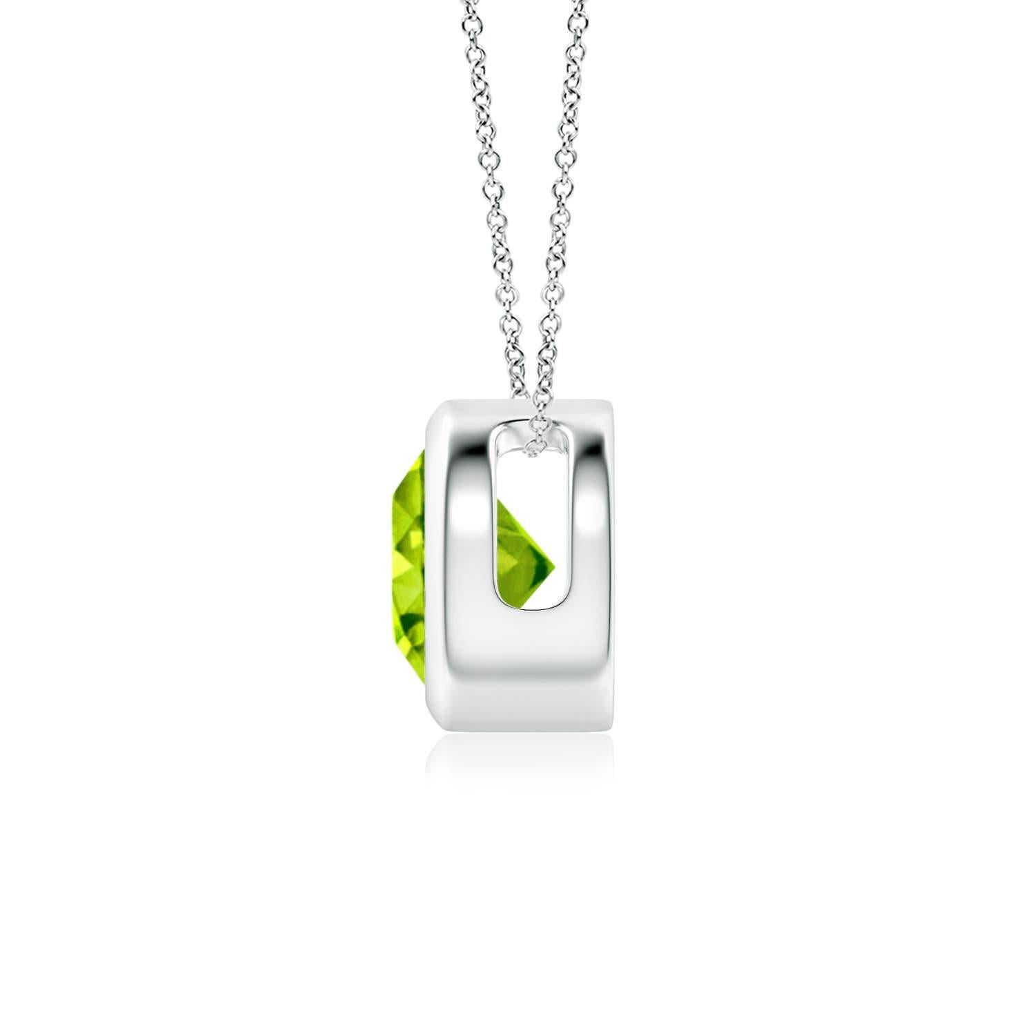 Der olivgrüne runde Peridot scheint auf der Kette zu schweben. Er ist in einer Lünette aus 14 Karat Weißgold gefasst. Dieser schlichte, aber verführerische Peridot-Anhänger ist ein elegantes Statement. Erhältlich in verschiedenen Karatgewichten.