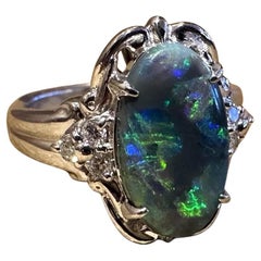 Bague en platine avec opale noire naturelle et diamant