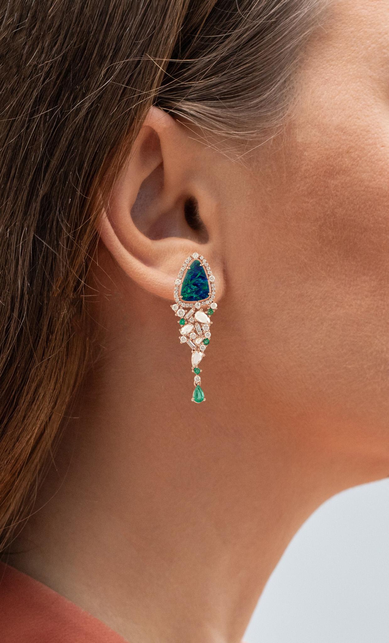 It comes with the appraisal by GIA GG/AJP
All Gemstones are Natural
Opal = 3.41 Carats
 Emerald = 0.68 Carats
Diamonds = 1.78 Carats
Cut: Mixed Cut
Earrings Dimensions: 42 x 12 mm
Metal: 18K Rose Gold
