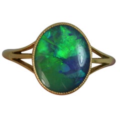 Natural Black Opal Solitaire 18 Carat Gold Ring
