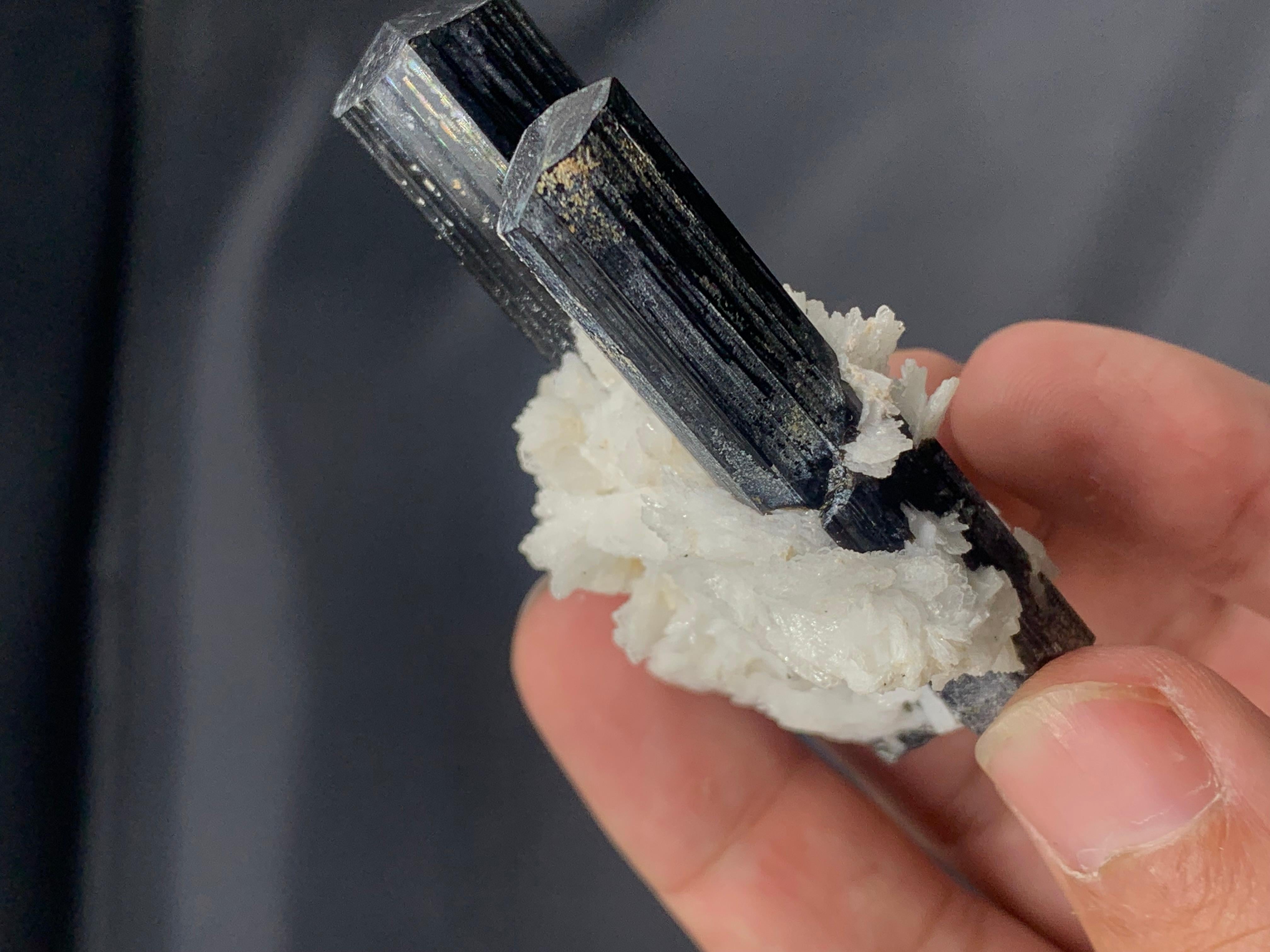 Natural black tourmaline twins specimen elongated on mica mother Rock 
WEIGHT : 59.48 grams
DIMENSIONS : 2.677 x 1.77 x 0.944 cm
ORIGIN : Skardu Valley, Pakistan
TREATMENT None
Tourmaline is an extremely popular gemstone; the name Tourmaline is