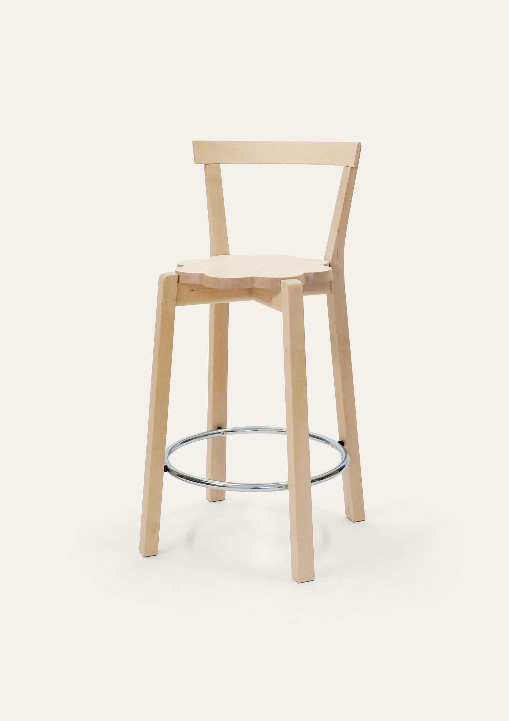 Natural Blossom bar chair by Storängen Design
Dimensions: D 48 x W 43 x H 92 x SH 65 cm
Materials: birch wood, steel.
Available in other colors and sizes. With or without backrest.

A small and neat stackable chair, which works well round