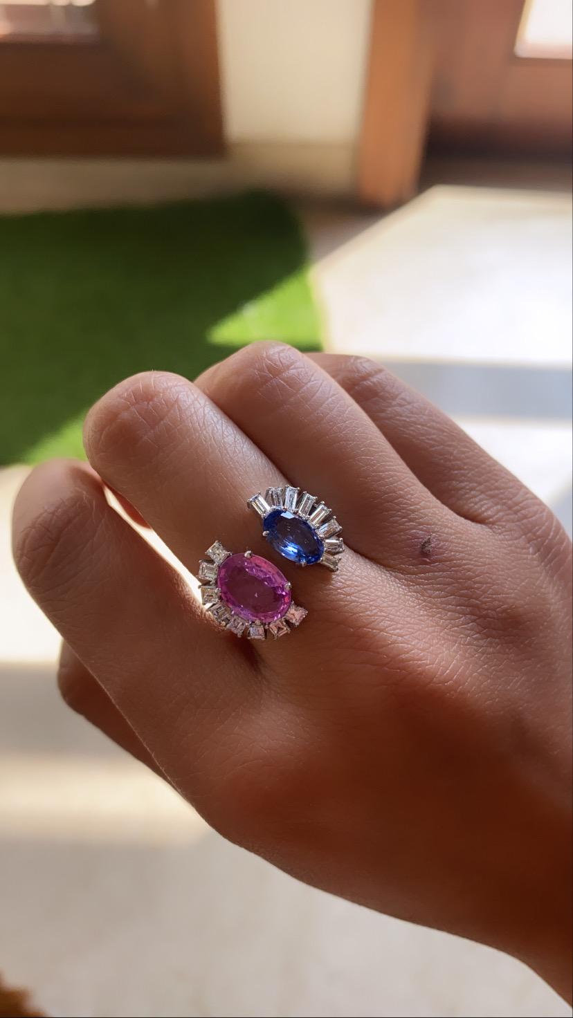 A modern and chic blue and pink sapphire ring set in 18k white gold with natural diamonds. The sapphires combined weight is 3.47 carats and diamond weight is 1.06 carats . The net gold weight is 5.204 grams and ring dimensions in cm 1.6 x 2.2 x 2