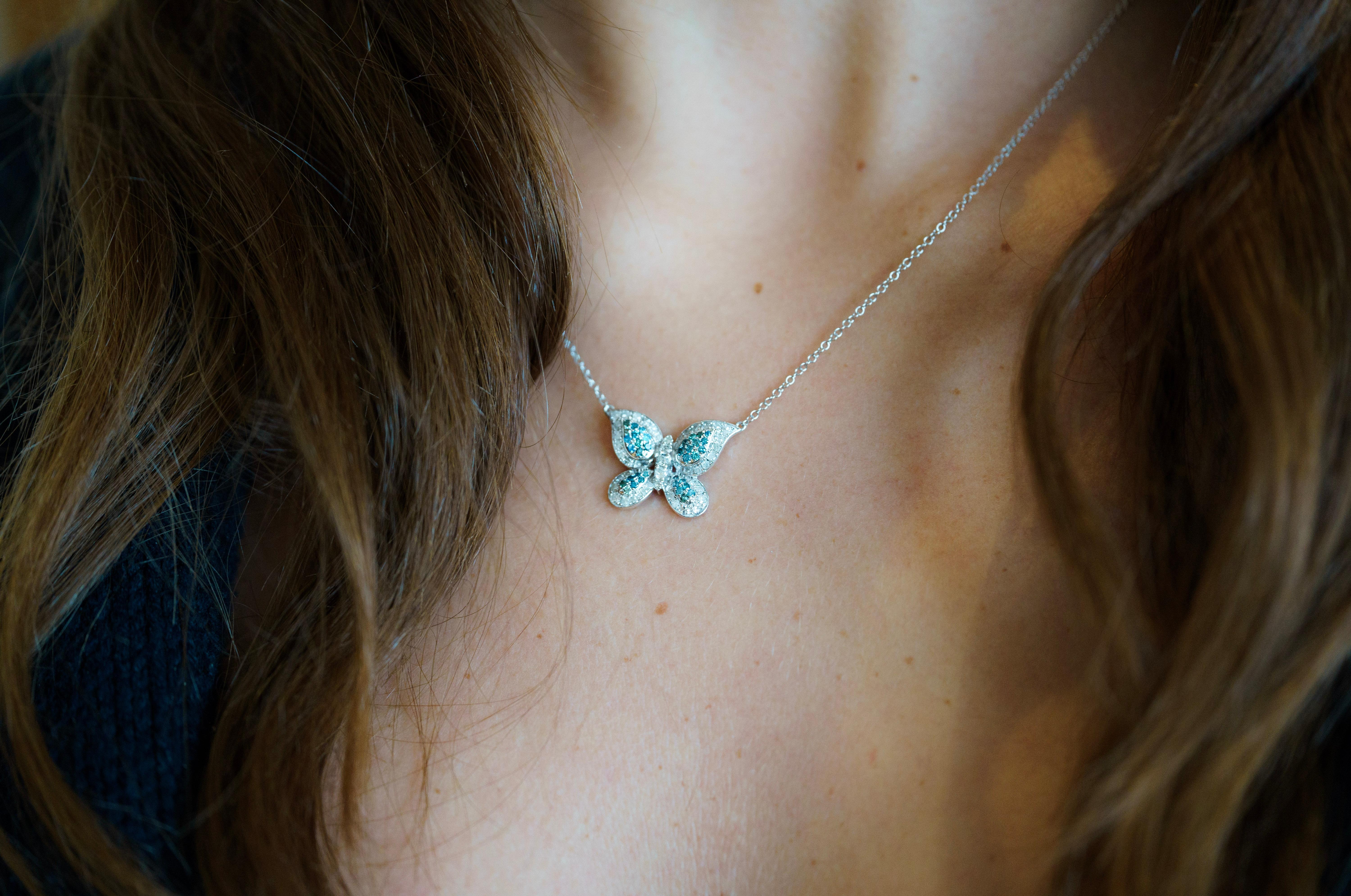 Natural Blue and White Diamond Cluster Floating Butterfly 14K Chain Necklace In New Condition For Sale In Miami, FL