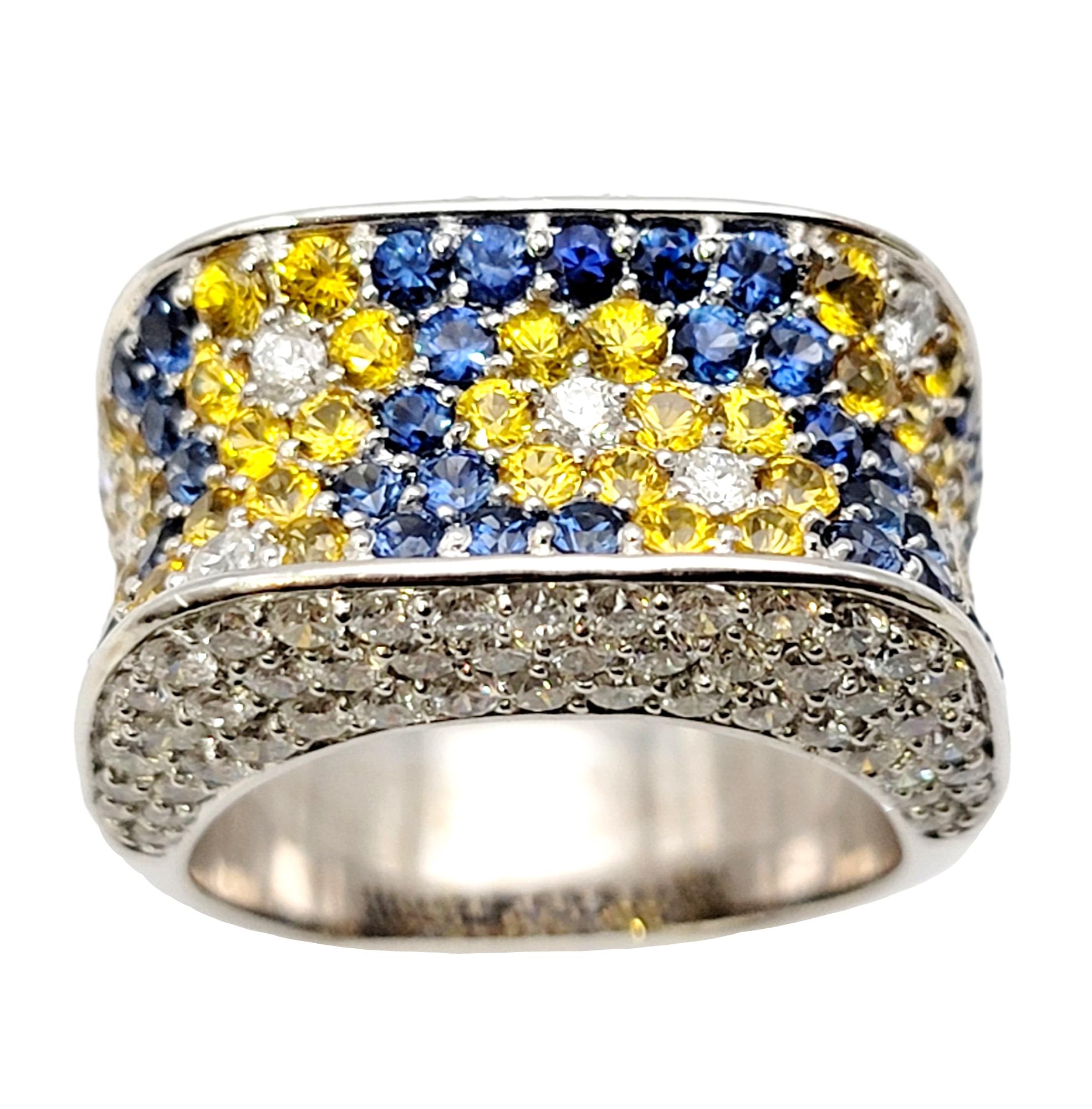 Ring size: 8.75

Super sparkly multi-color sapphire and diamond saddle band ring will fill your finger with joy! This bright, cheerful piece is bursting with color, personality and design while the dazzling gemstones make it truly glow on the