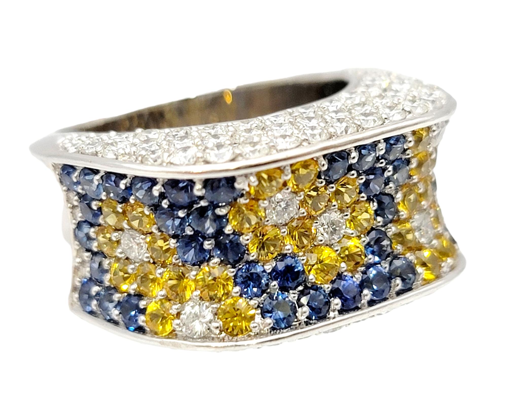 Contemporary Natural Blue and Yellow Sapphire and Diamond Flowers Saddle Ring in White Gold For Sale