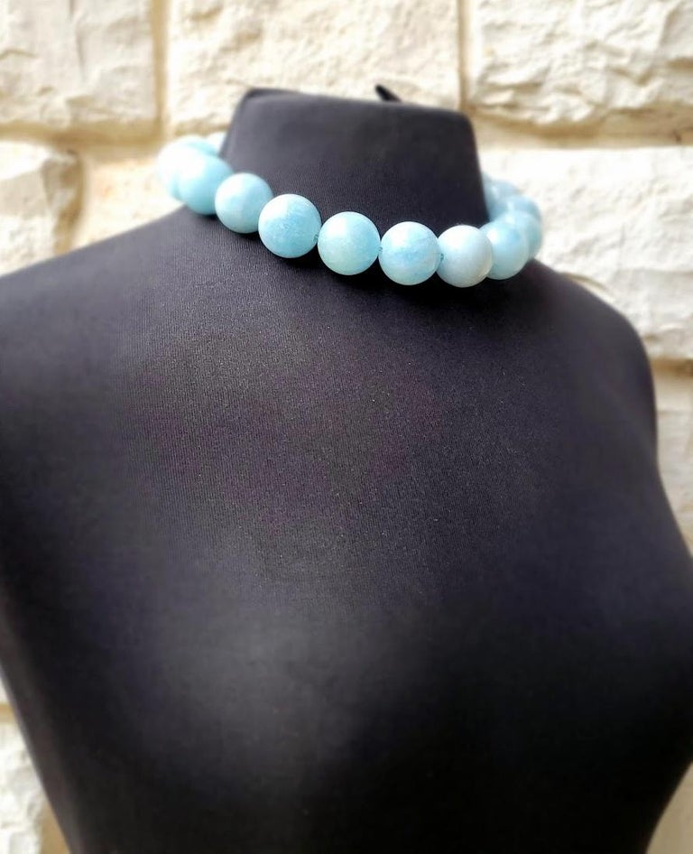 The length of the necklace is 18 inches (45.7 cm). The very rare size of the smooth round beads is 24 mm.
The color of the beads is a soft shade of blue sky. A very gentle soft pastel color! Huge statement beads of Blue Aquamarine! Aquamarine is a