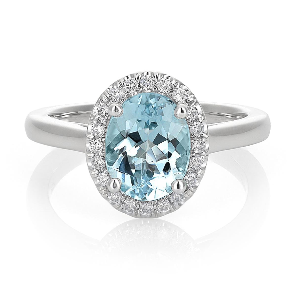 Discover the captivating elegance of this natural aquamarine ring, exquisitely set in 14K white gold. This exceptional piece, complemented by sparkling diamonds, showcases the finest craftsmanship and the enchanting beauty of these precious