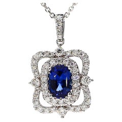 Natural Blue Cushion Sapphire and White Diamond 1.62 Carat TW White Gold Pendant