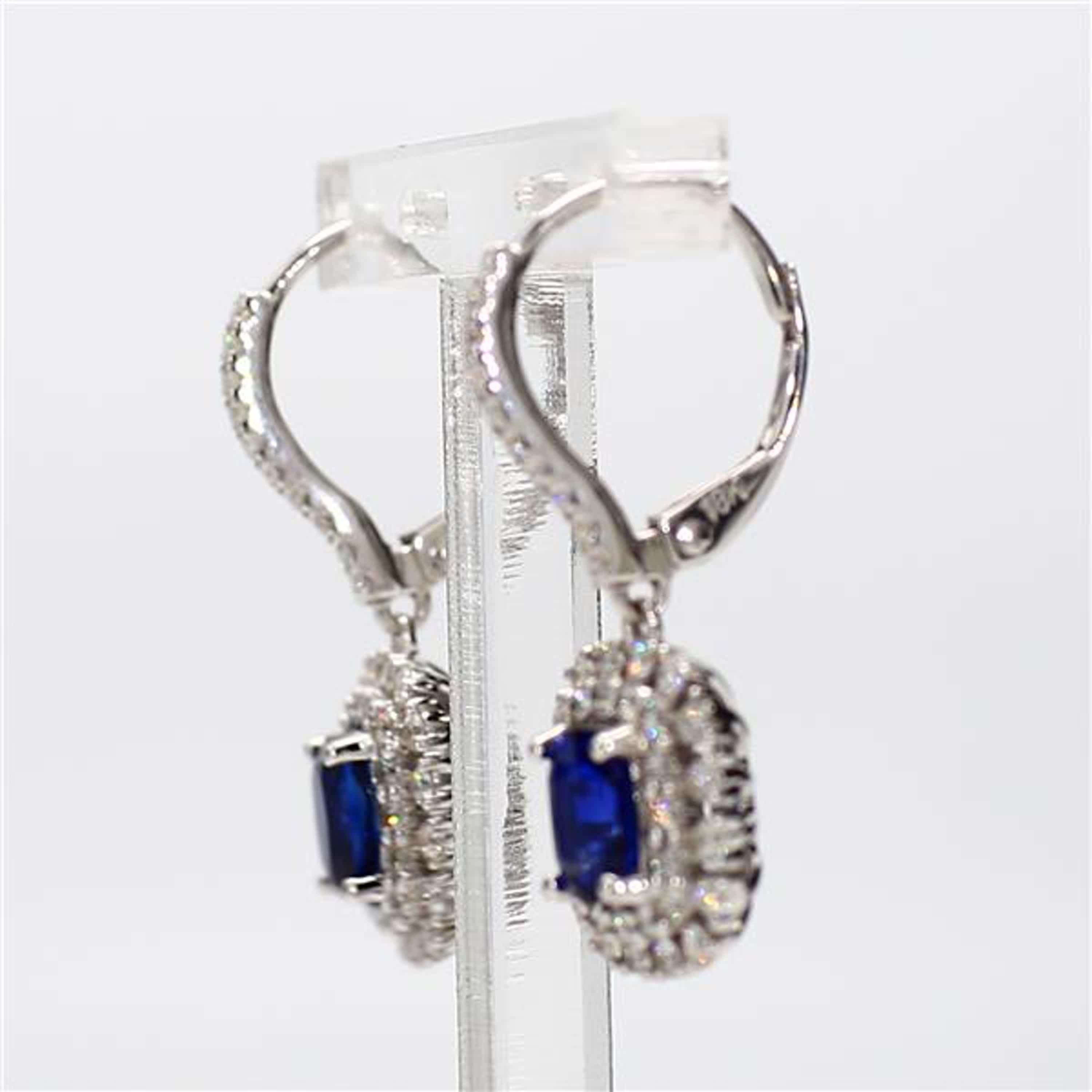 Contemporary Natural Blue Cushion Sapphire and White Diamond 2.53 Carat TW Gold Drop Earrings For Sale