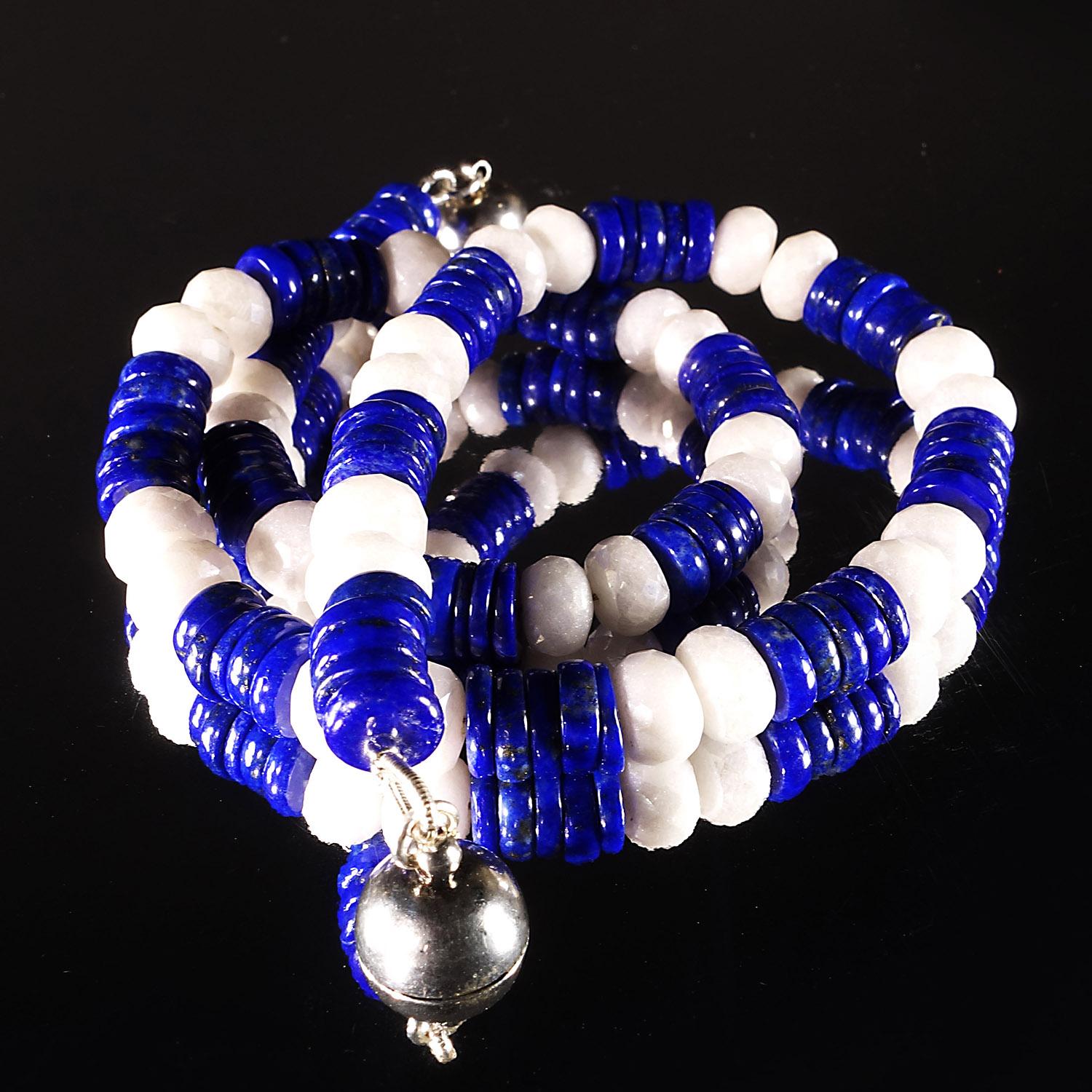 Handmade, sparkling necklace of natural blue Lapis Lazuli rondels (7mm) and faceted coated white Quartz rondels (8mm).  This striking choker is perfect for Spring and Summer.  Blue and White is so crisp and cool.  Wear this unique 15 inch choker