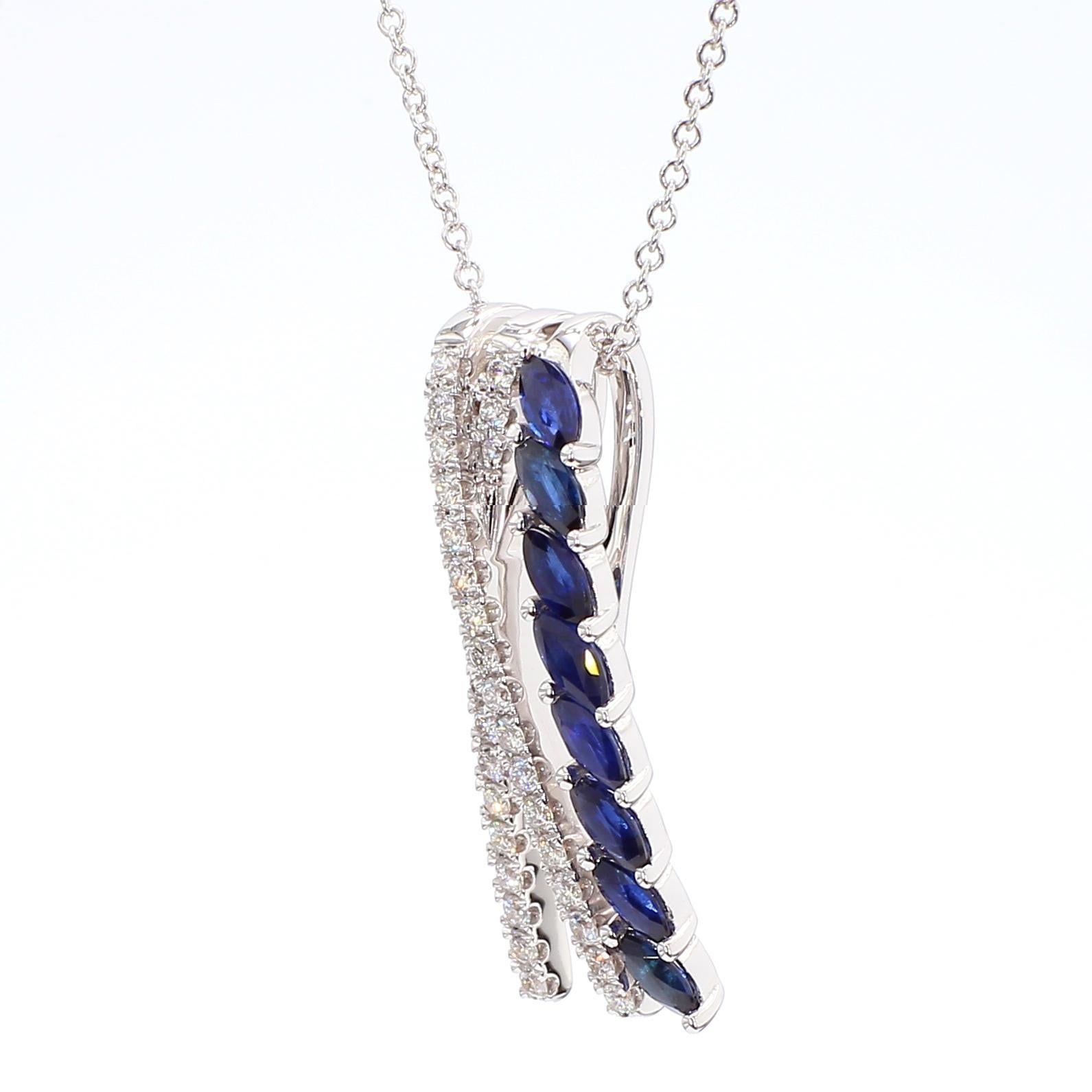 RareGemWorld's beautiful sapphire Pendant. Mounted in a beautiful 18K White Gold setting with natural marquise cut blue sapphires complimented by natural round white diamond melee. This Pendant is guaranteed to impress and enhance your personal
