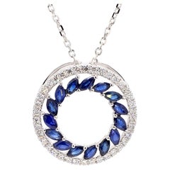 Pendentif en or de 2.09 carats poids total avec saphir bleu marquise naturel et diamants