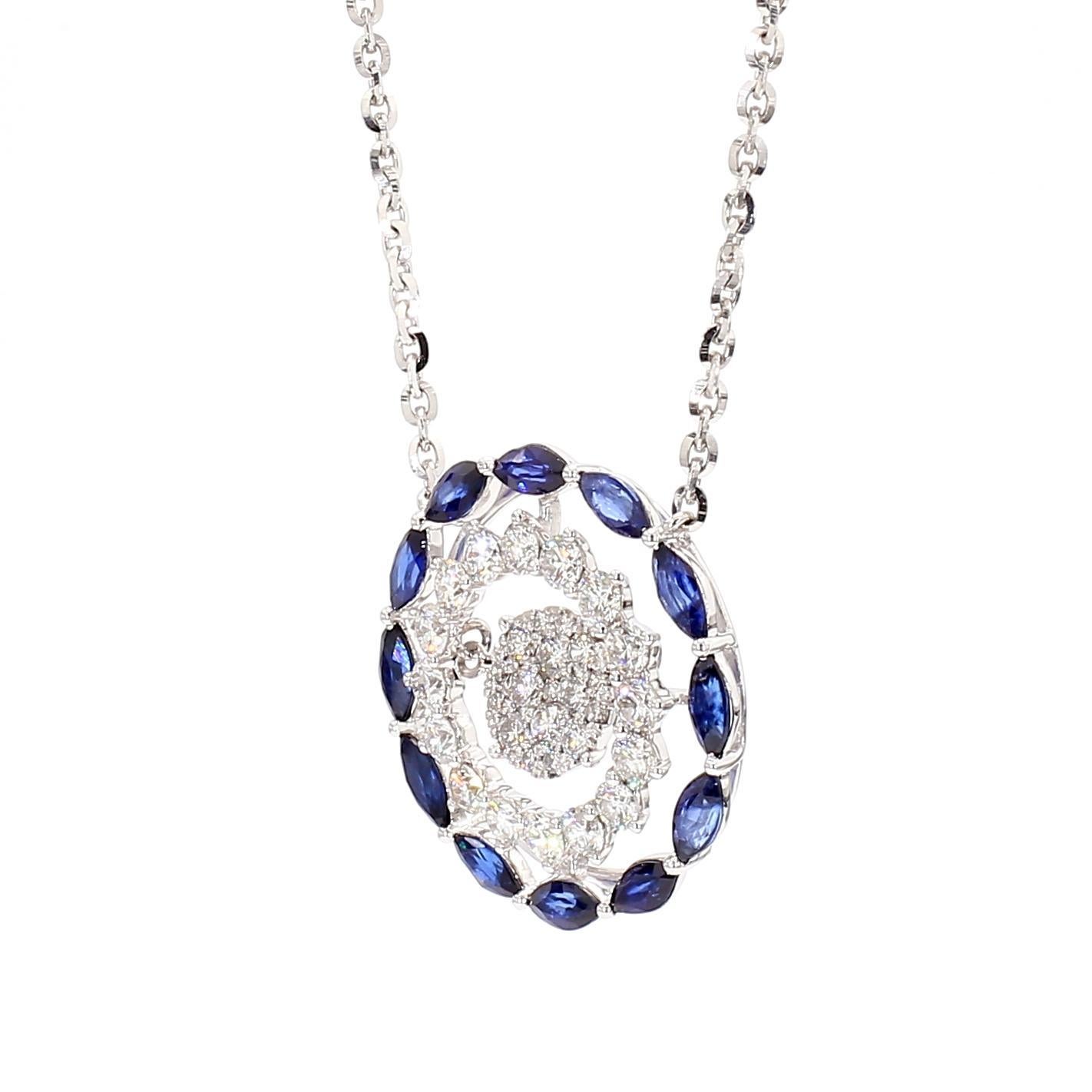 Le magnifique pendentif en saphir de Raregemworld. Monté dans une belle monture en or blanc 18 carats avec des saphirs bleus naturels taillés en marquise, complétés par une mêlée de diamants blancs ronds naturels. Ce pendentif est garanti pour
