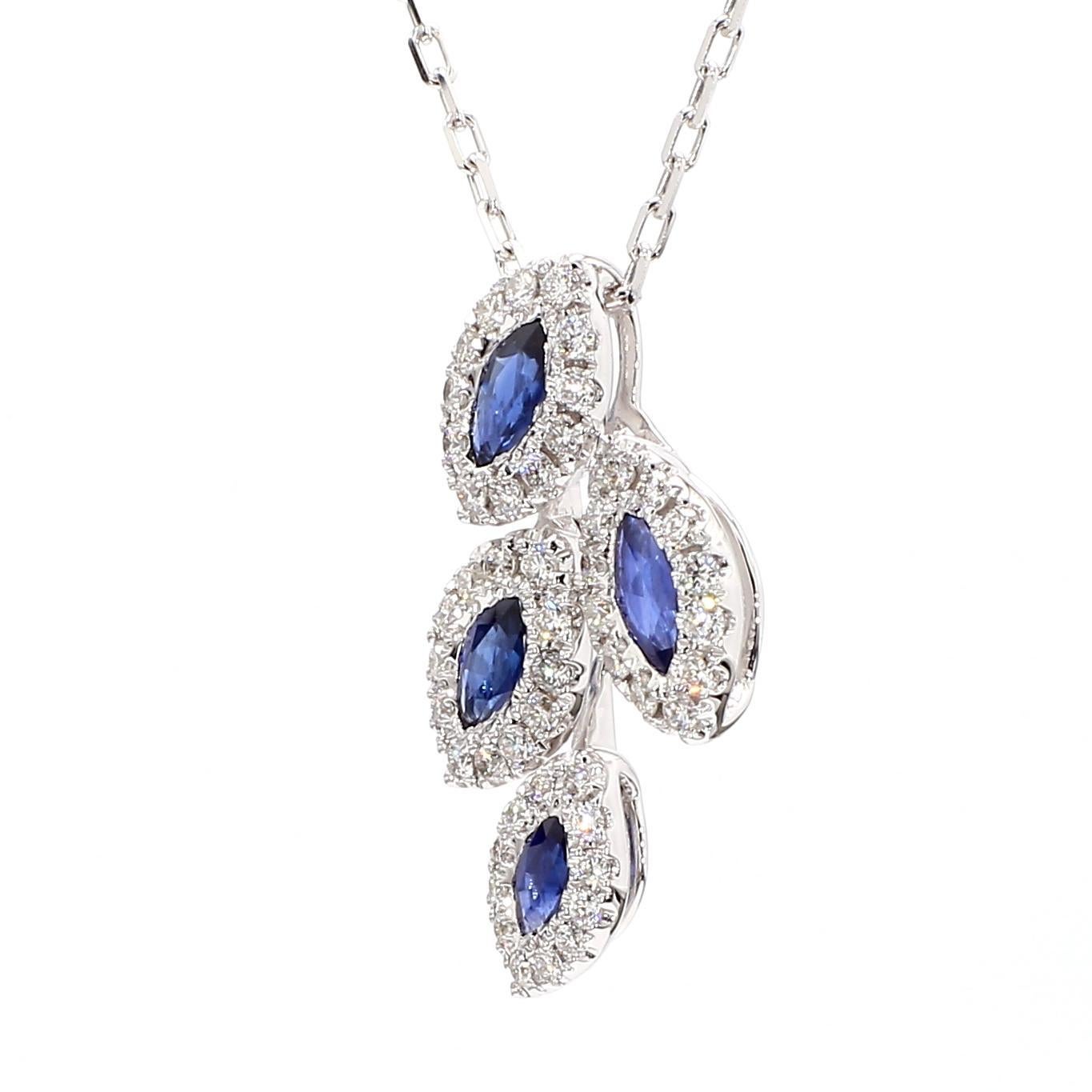 RareGemWorld's beautiful sapphire pendant. Mounted in a beautiful 18K White Gold setting with a natural marquise cut blue sapphires. The sapphires are surrounded by natural round white diamond melee. This pendant is guaranteed to impress and enhance