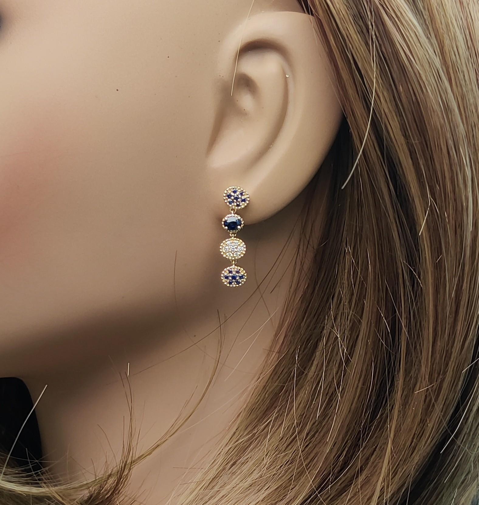 Orecchini a goccia in oro con zaffiro ovale blu naturale e diamante bianco da 0.87 carati TW In condizioni Nuovo in vendita a New York, NY