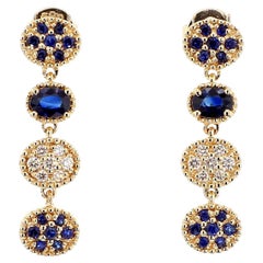 Pendientes de gota de oro con zafiro ovalado azul natural y diamante blanco de 0.87 quilates TW
